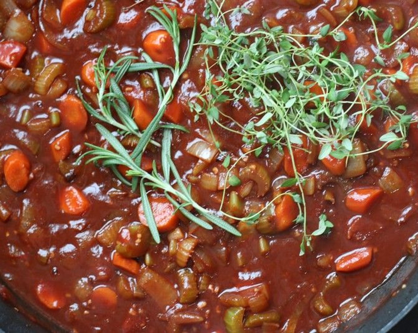 step 9 Add Beef Stock (8 cups), Fresh Rosemary (1 sprig), and Fresh Thyme (1 sprig) and heat to boiling. Remove skillet from heat.