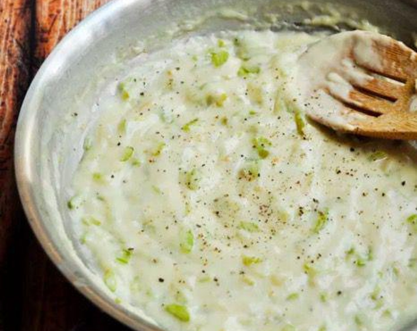 step 5 Whisk in Whole Milk (1/2 cup) and Chicken Bone Broth (1/2 cup). Bring to a simmer and cook for 5-8 minutes, until it has thickened.