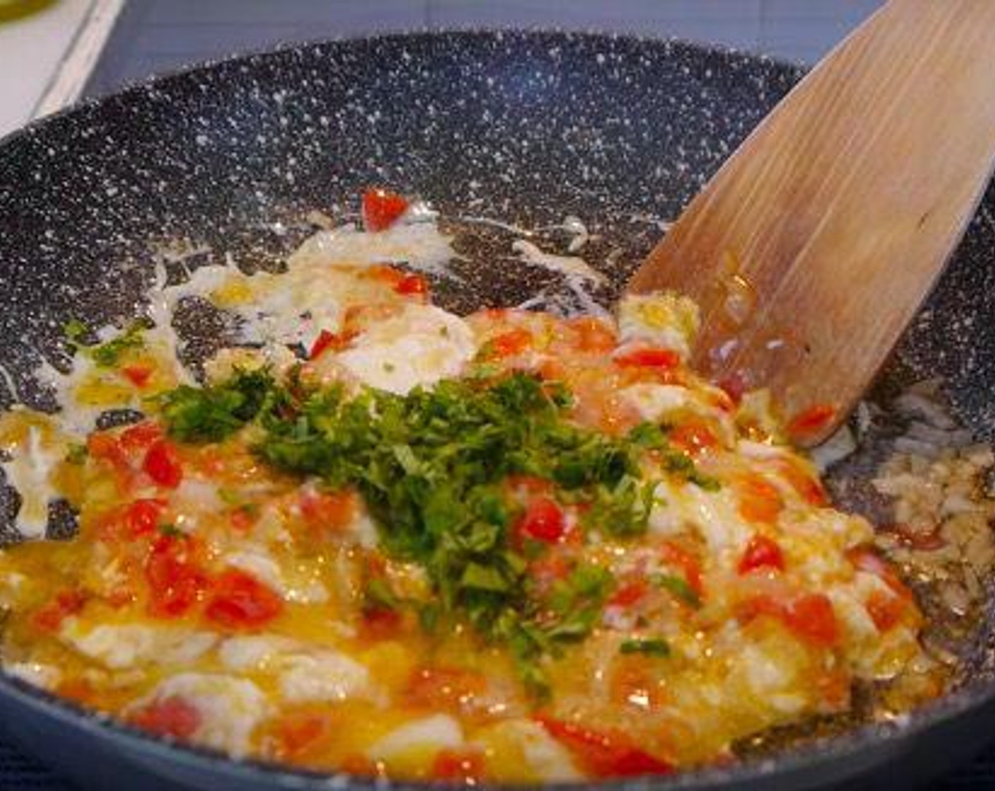 step 4 Halfway through the cooking, add the Fresh Cilantro (3 Tbsp) and continue to scramble.