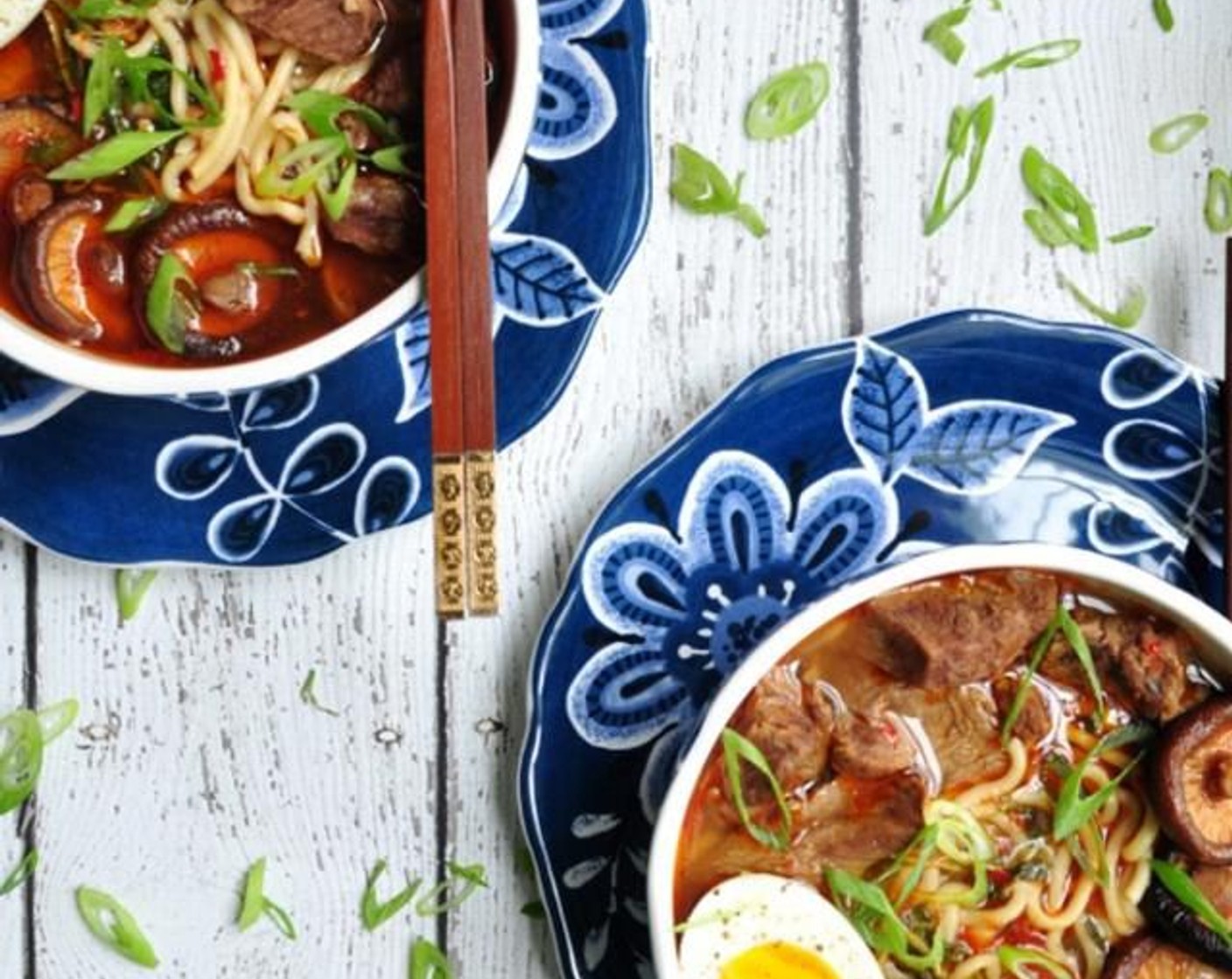 step 10 To serve, divide the noodle soup into 4 bowls evenly; drizzle with Sesame Oil (as needed) place one soft-boiled egg in each bowl; sprinkle with chopped Scallion (1 bunch). Serve and enjoy!