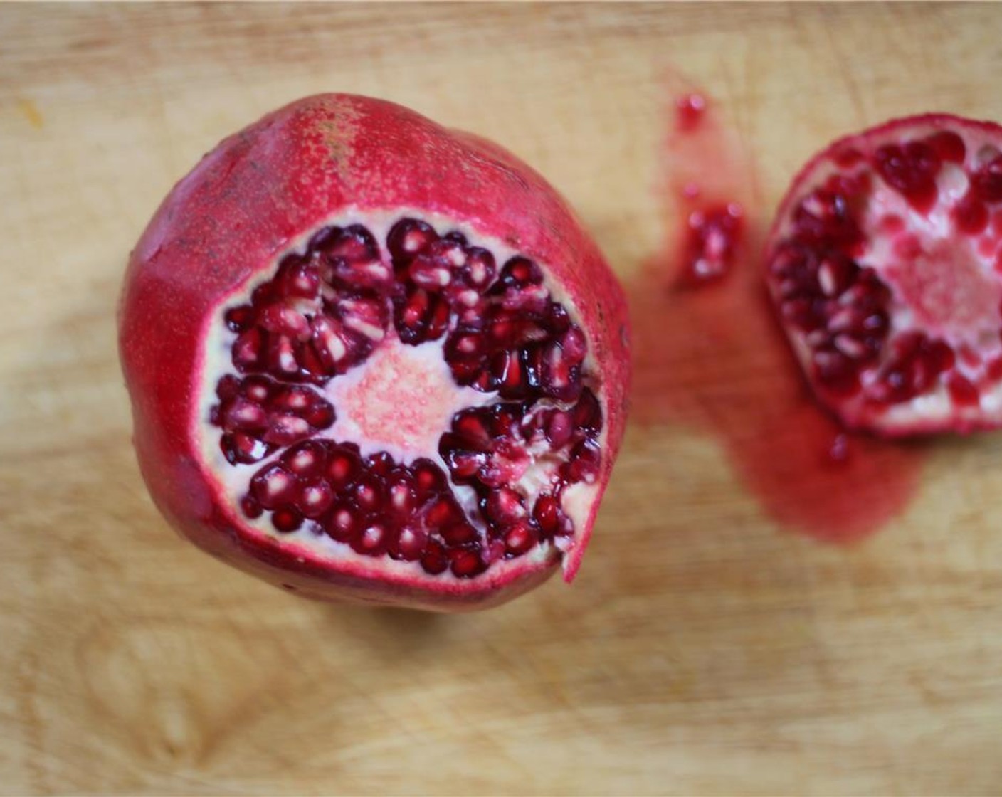 step 5 Yield the Pomegranate Seeds (1/4 cup) from the pomegranate by cutting off the stem, and scoring the pomegranate skin in quarters.