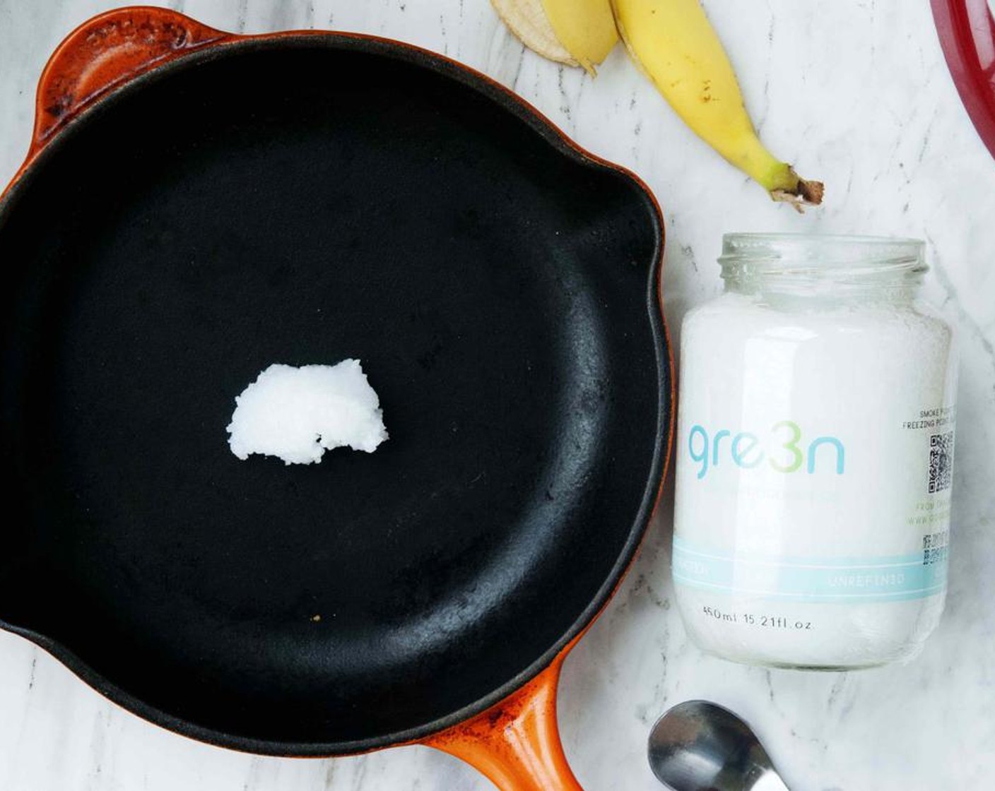 step 1 In a skillet, melt Extra-Virgin Coconut Oil (1 tsp), cut the Banana (1) in half length-wise and give it a quick blister on one side. The natural sugar in the banana will slightly caramelize making it crunchy.