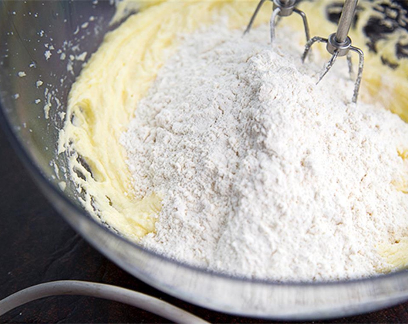 step 4 Stir in the All-Purpose Flour (4 cups), Salt (1 tsp), Baking Soda (2 tsp), Simply Organic Cinnamon, Ground (2 tsp), and Ground Nutmeg (2 tsp).