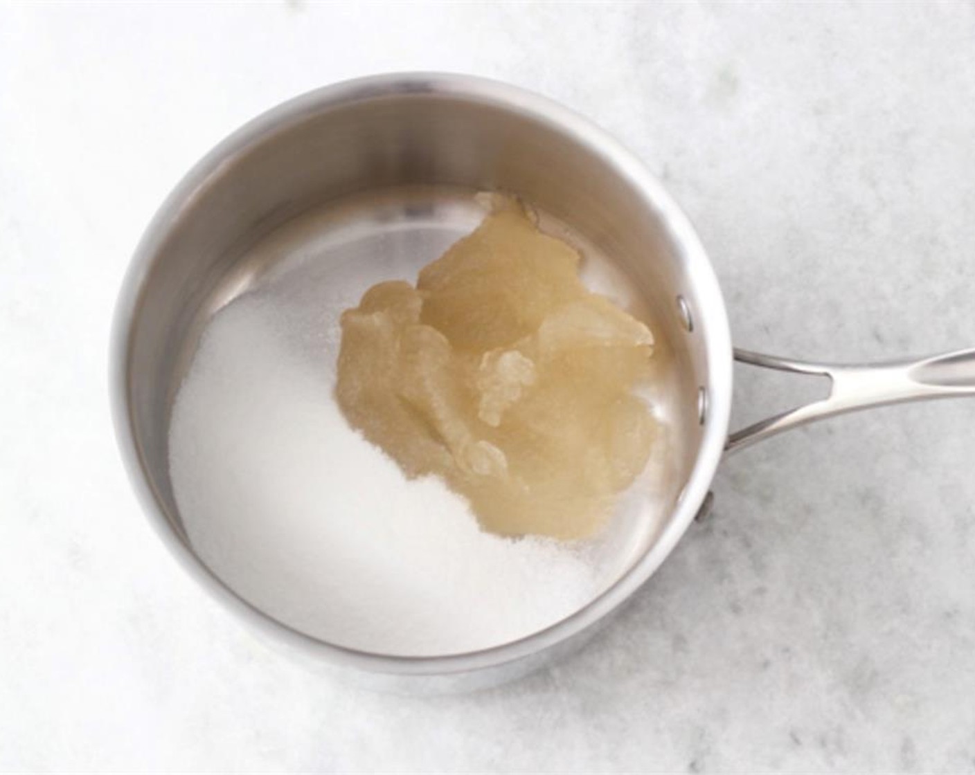 step 16 Add the bloomed gelatin mixture to a heavy-bottomed saucepan along with the first half of the Granulated Sugar (1/2 cup).