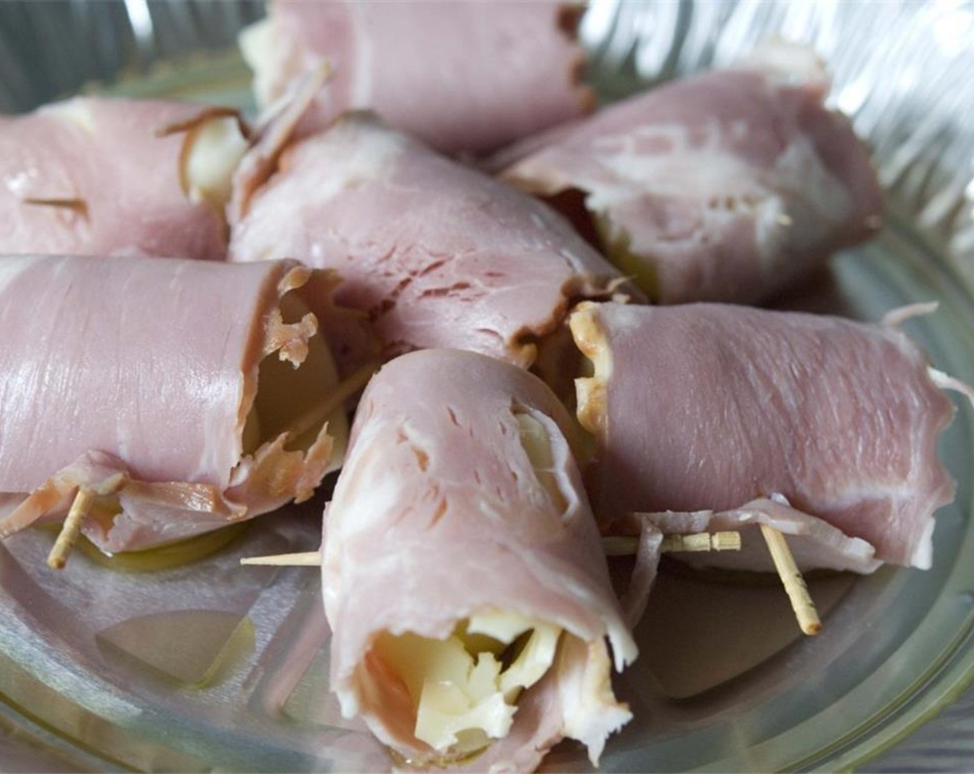 step 7 Place the tidbits in a baking tray with Olive Oil (1 tsp).