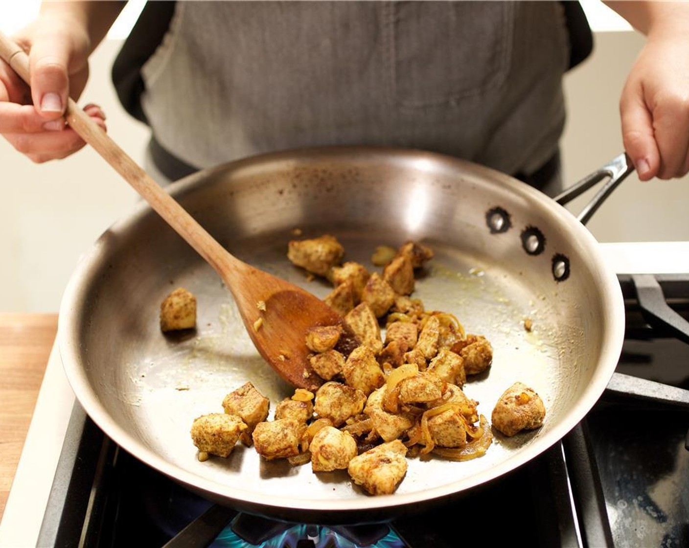 step 8 Add the chicken and stir to combine. Reduce heat to medium and cook for eight minutes, or until the chicken is cooked through.