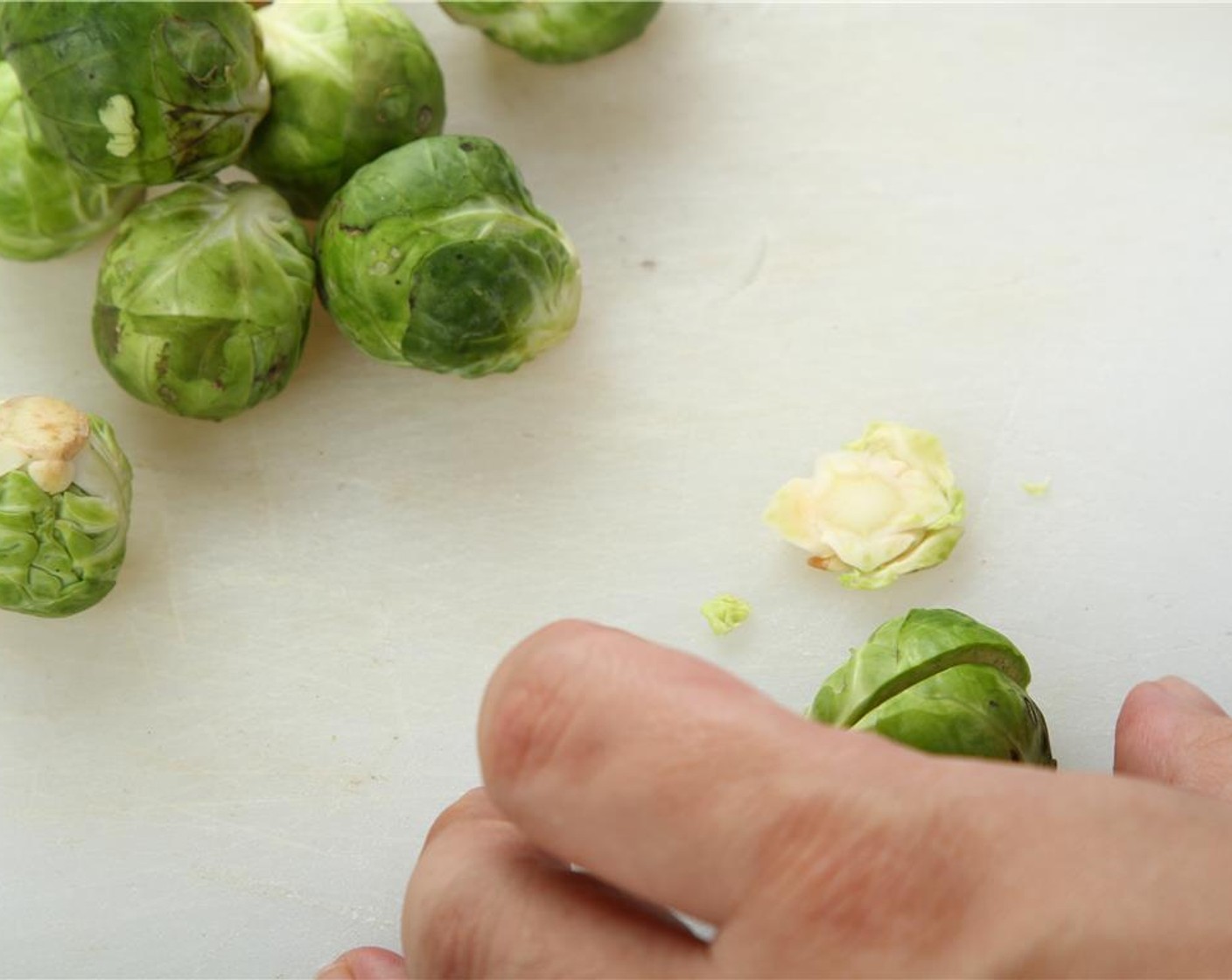 step 21 With a sharp knife, remove the bottom stem part of the Brussels Sprouts (5 1/2 cups).