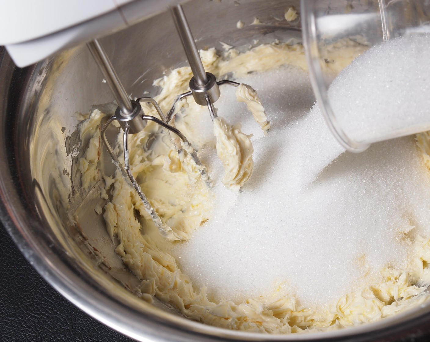 step 3 In a large bowl, combine the All-Purpose Flour (1 1/2 cups), Granulated Sugar (1 cup), Baking Powder (1/2 Tbsp), and Salt (1/4 tsp). Next, add in the Eggs (3), Low-Fat Vanilla Greek Yogurt (3/4 cup), Vegetable Oil (1/2 cup), and 3 Tbsp zest and 1/4 cup juice from the Navel Oranges (2) until smooth and combined; be sure not overmix