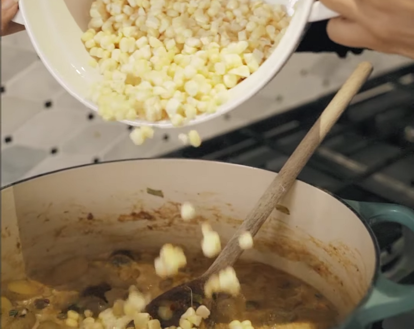 step 7 Now add your Corn (2 cups) and Water (2 cups), stir the soup mixture well, and increase heat to high to bring mixture to a boil. Once boiling, reduce heat to low and simmer the mixture for 30 minutes to until potatoes are cooked till soft (use a fork to test).