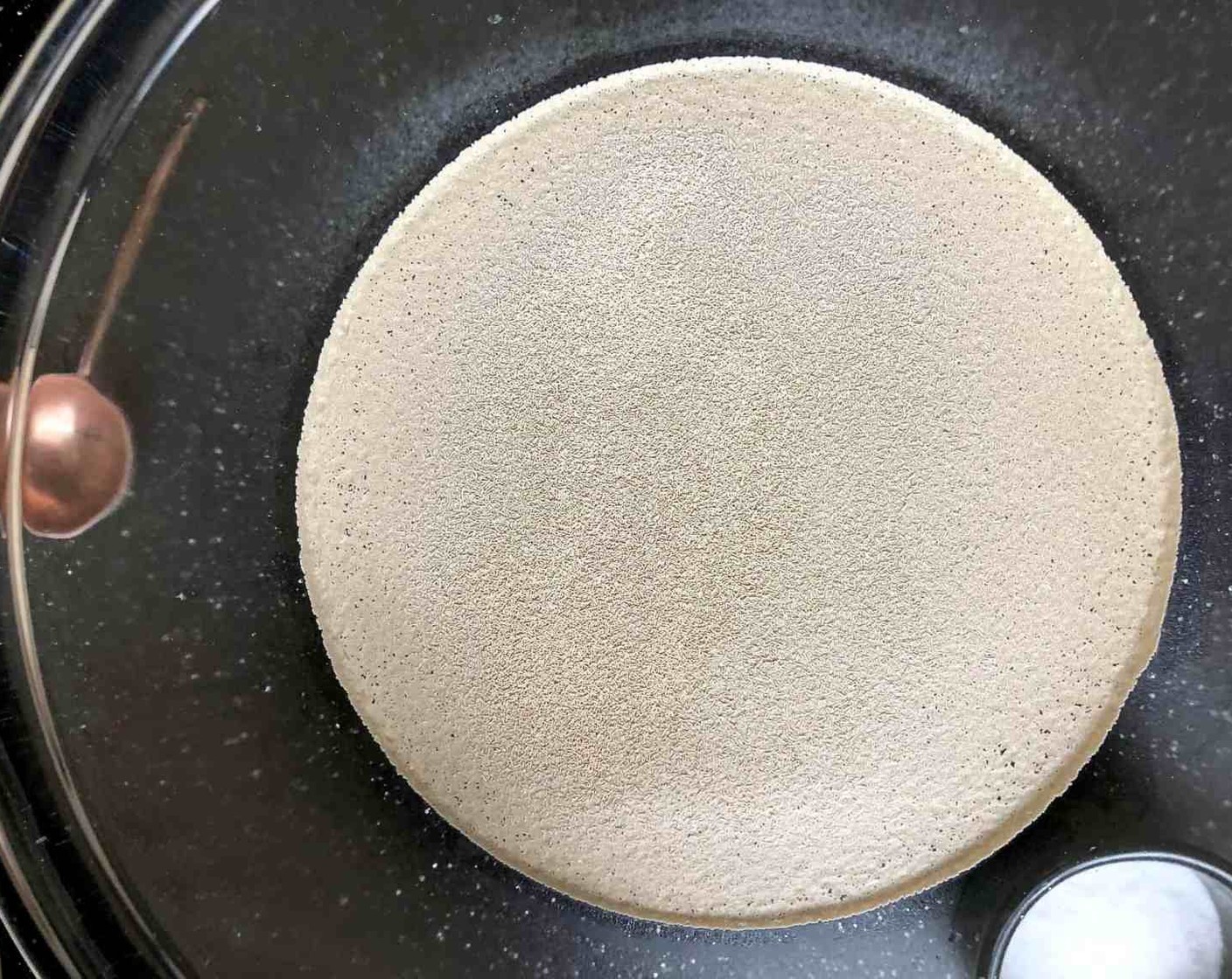 step 2 In a very large bowl or a 6-quart container with a lid, mix the Active Dry Yeast (1 Tbsp) and Kosher Salt (1 Tbsp) with the warm water. Don’t worry about getting the yeast to dissolve.