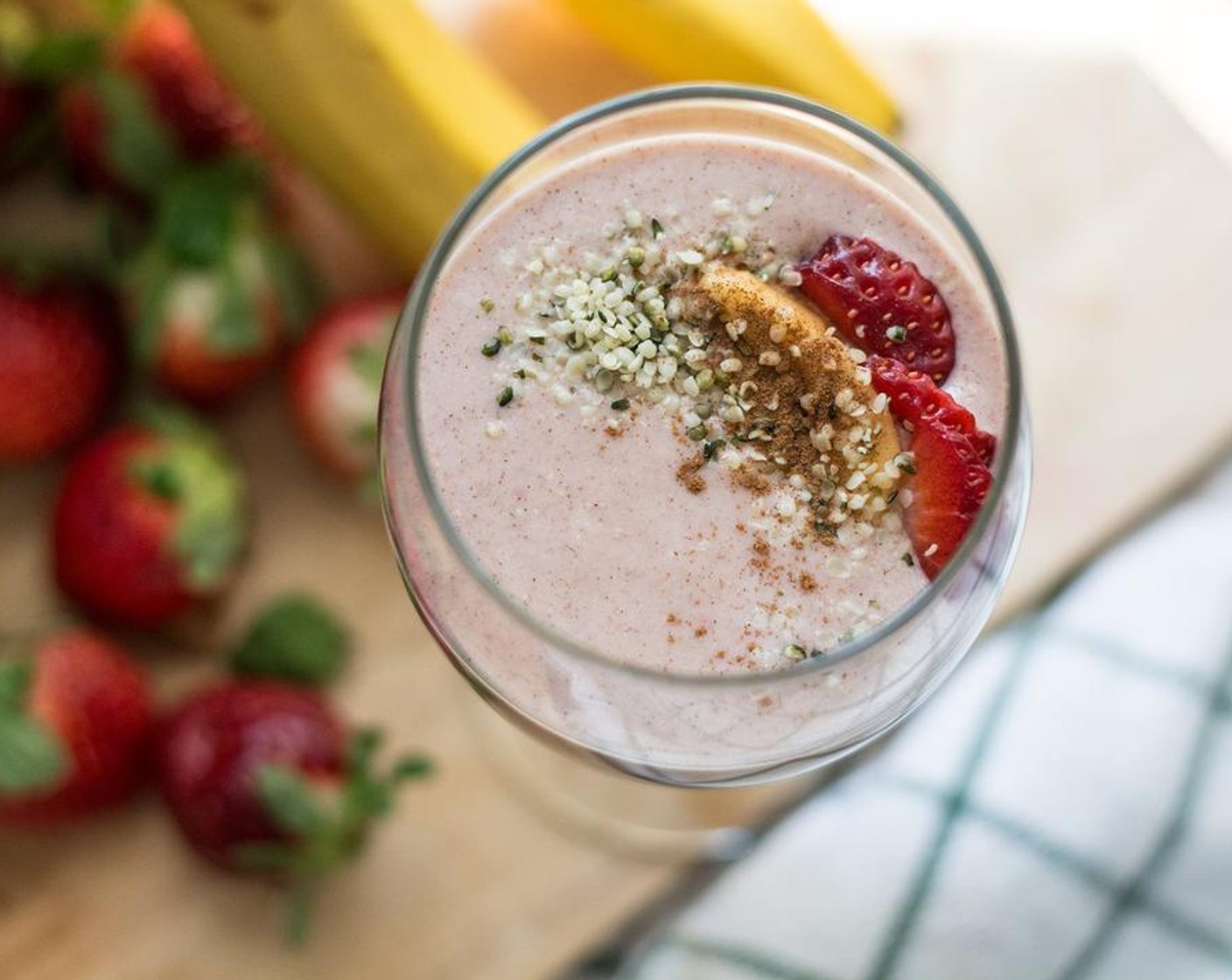 step 2 Divide into two glasses and top with additional hemp seeds, ground cinnamon, strawberries or papaya. Enjoy!
