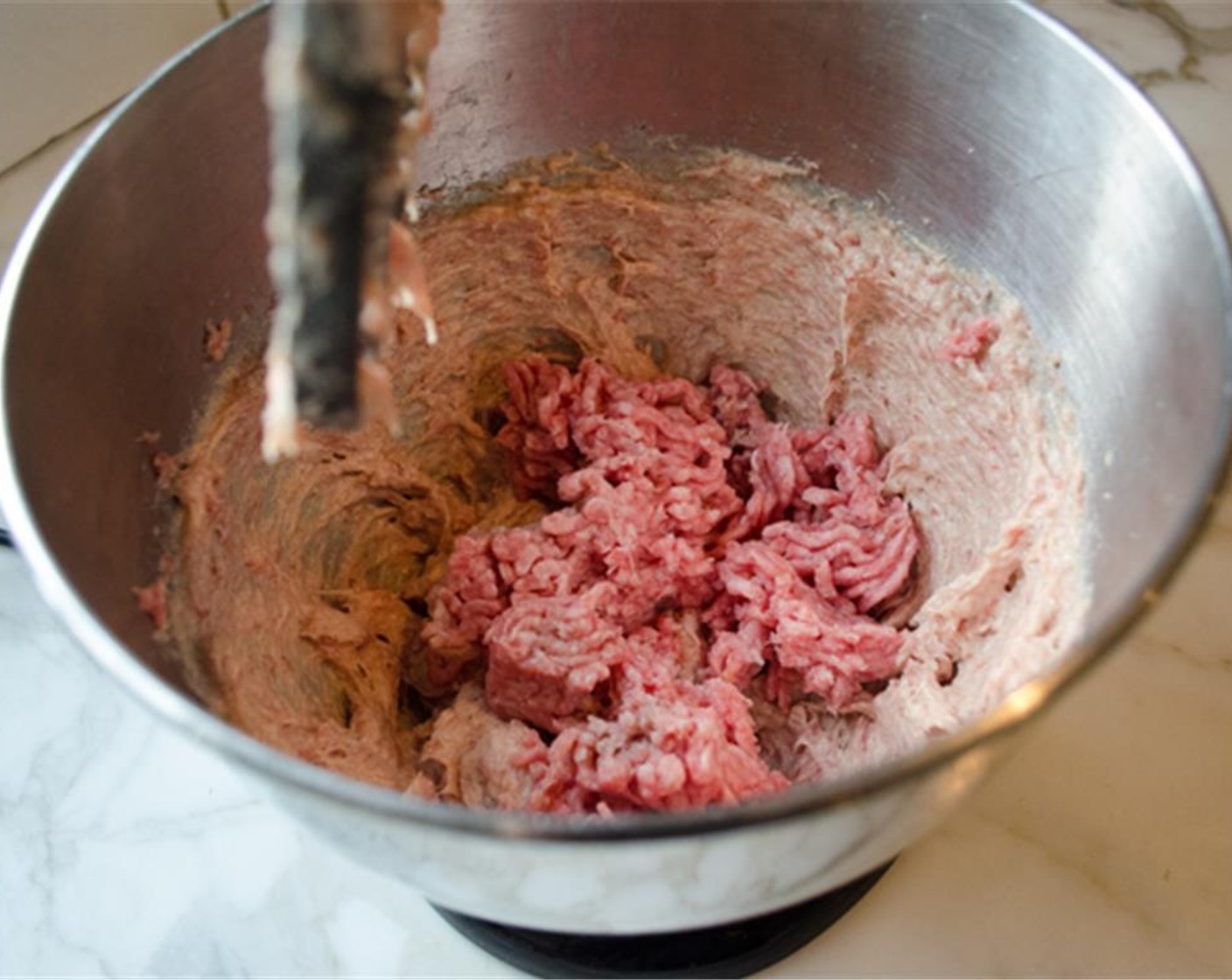 step 6 Add the 85/15 Lean Ground Beef (8 oz) and mix on medium-low speed until just incorporated, about 20 seconds, scraping the bowl as necessary.