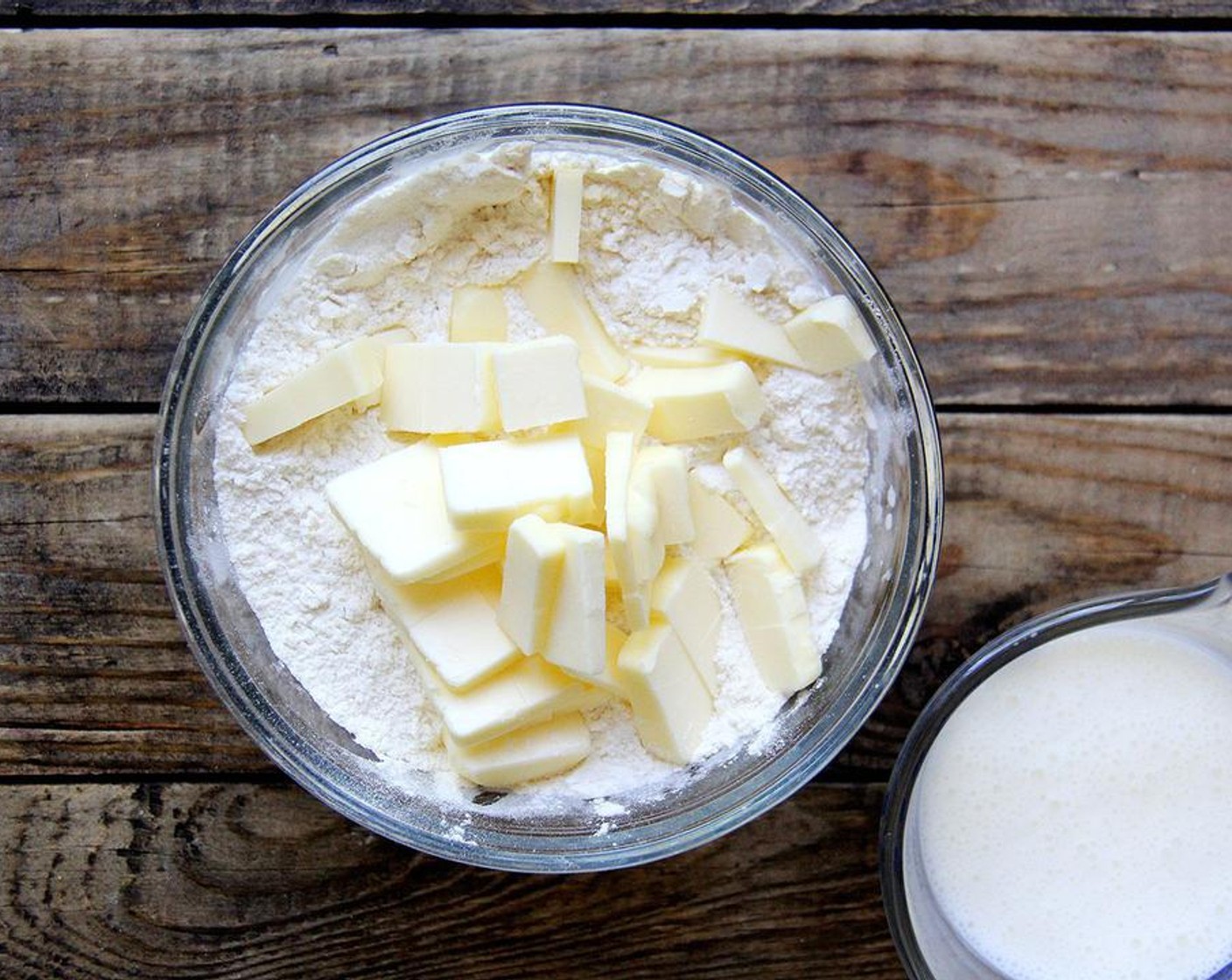 step 4 Meanwhile, whisk the All-Purpose Flour (1 cup), Granulated Sugar (1/4 cup), Baking Powder (1/2 Tbsp), Baking Soda (1/4 tsp) and Salt (1/4 tsp) in a large bowl to combine. Cut Unsalted Butter (1/4 cup) into small pieces and use your fingers to incorporate the butter into the mixture — it's ok if the butter gets soft.