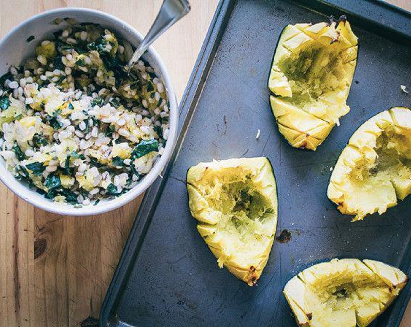 step 6 Remove acorn squash from the oven, scrape out cooked flesh from the center of each quarter and add flesh to barley and veggie mixture.