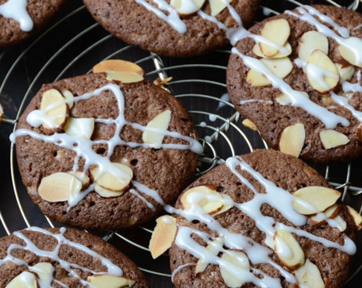 step 10 When the cookies have cooled to room temperature, spinkle with Sliced Almonds (1 cup), drizzle the glaze over them and let stand until glaze hardens.