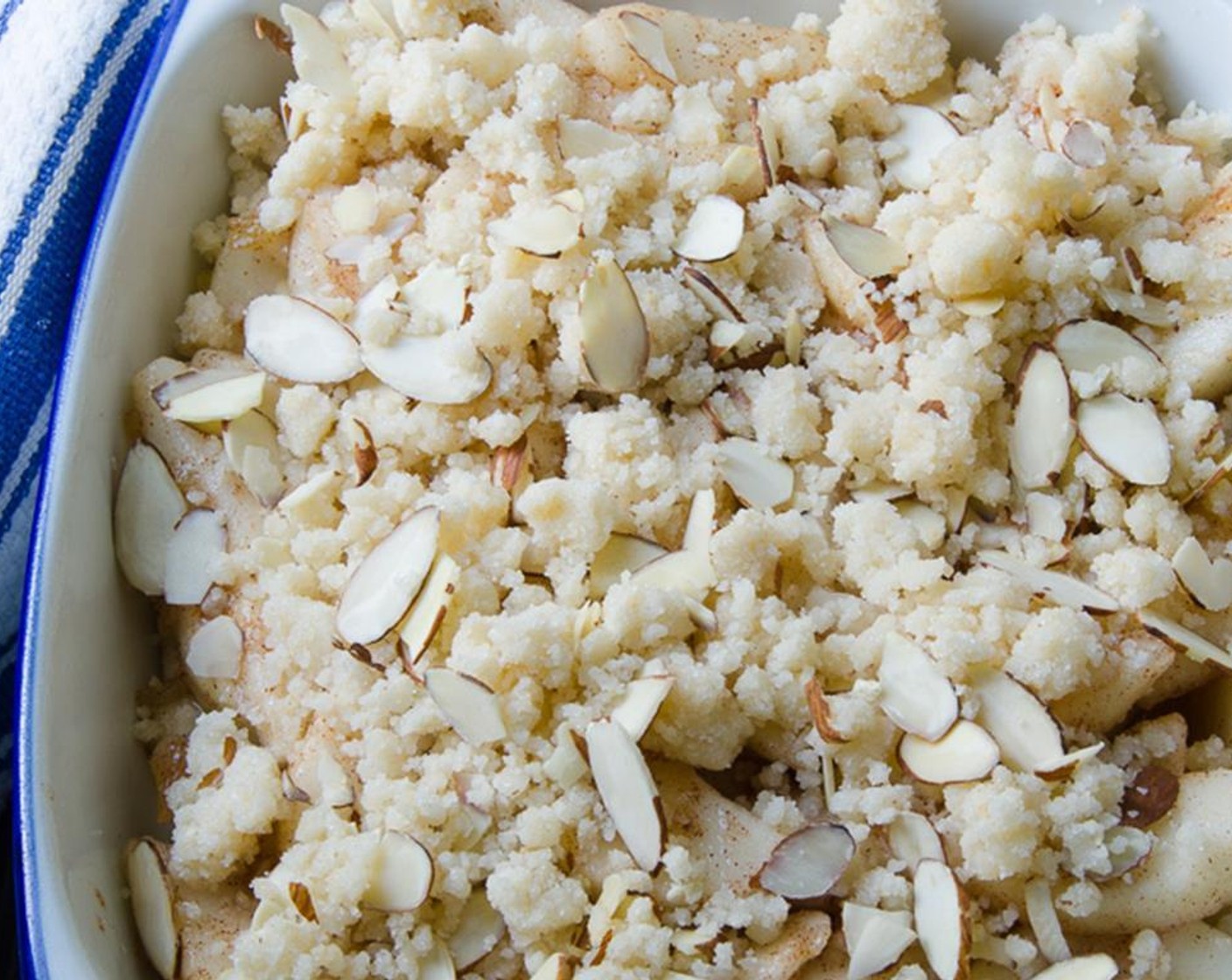 step 8 In a small bowl, mix the Water (2 Tbsp) and Corn Starch (1 tsp) together to form a slurry. Pour over the pears and toss to coat the pears with the slurry and spices. Transfer the pears to the prepared baking dish.