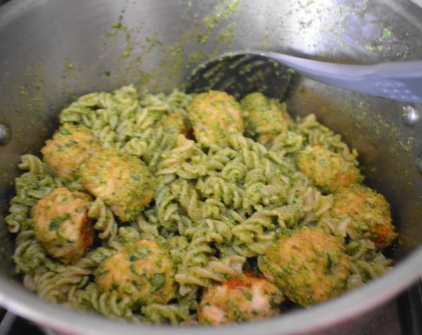 step 12 Add the meatballs and reserved cooking water to the pot and toss gently to fully combine. Finish the dish with a big additional drizzle of olive oil.