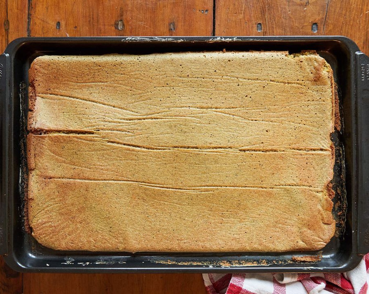 step 5 Bake the crust for 15 minutes. Flip the crust, removing the parchment paper, and bake for 10 minutes more, or until golden brown.