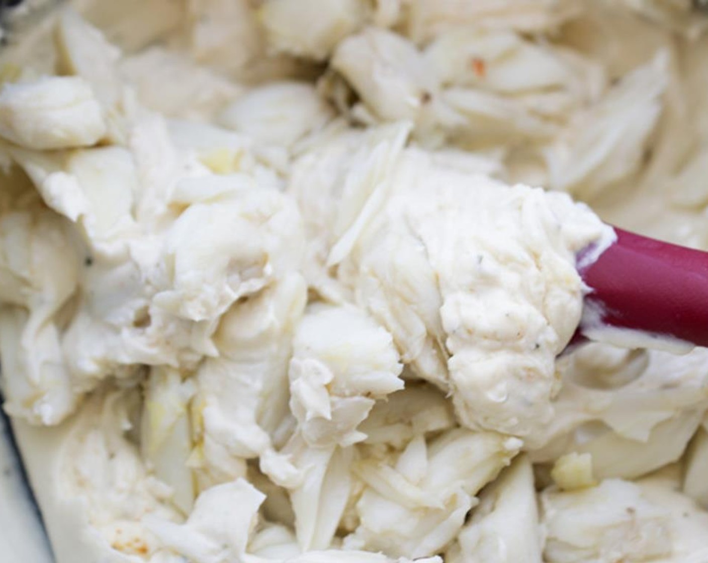 step 4 Take the sauce off the heat and fold in the jumbo Lump Crab Meat (1 lb) making sure not to break up the chunks of crab.