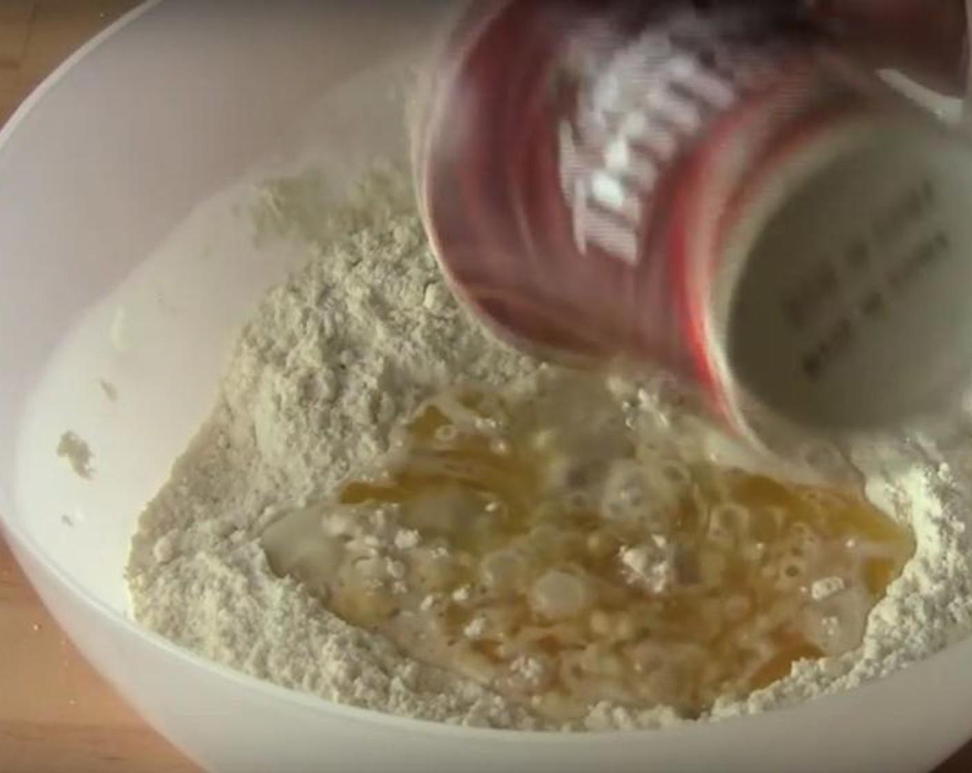 step 2 Pour All-Purpose Flour (3 cups) into a mixing bowl. Add Caster Sugar (1/4 cup). Mix them together. Add Egg (1), Milk (3/4 cup), Vanilla Extract (1 tsp), Butter (2/3 cup) with the yeast mixture in the center. Mix it all together.