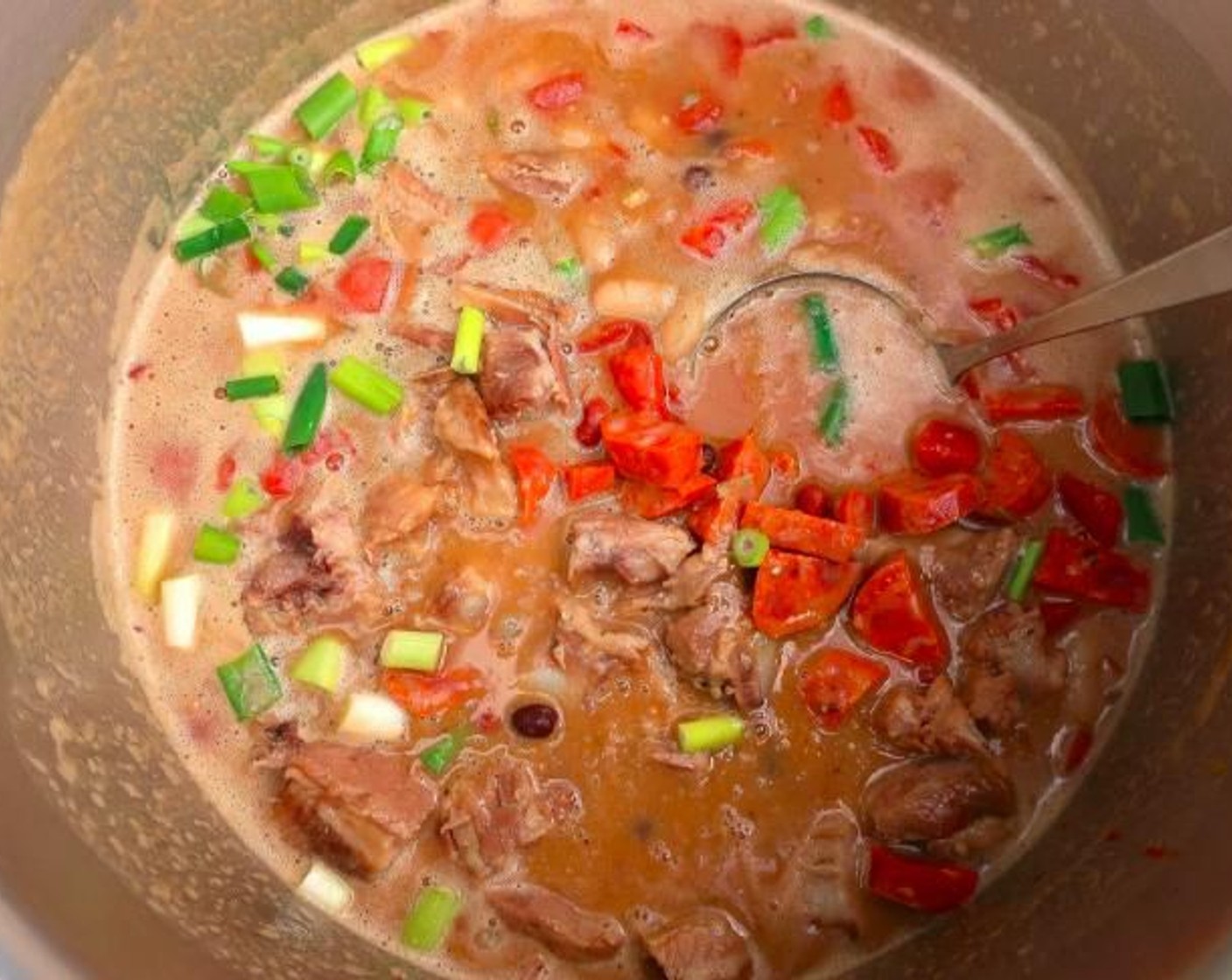 step 6 Add the pork and Smoked Sausages (to taste), simmer for another 3 minutes, then check/adjust seasonings.