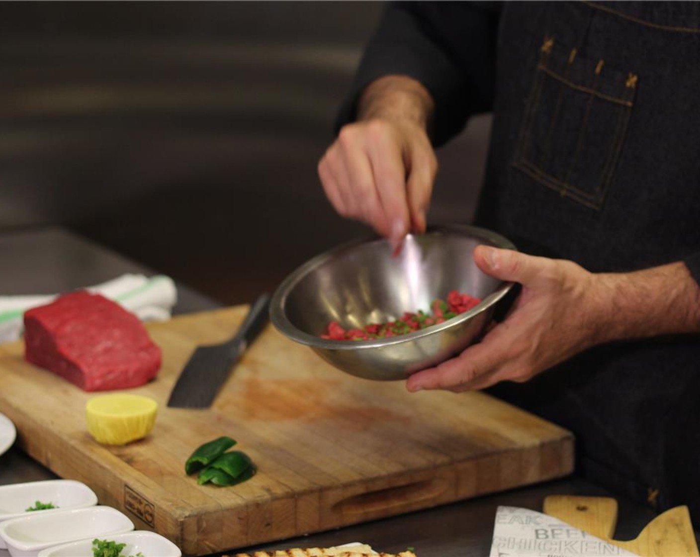 step 3 In a bowl, combine beef, Fresh Chives (1 Tbsp), Jalapeño Pepper (1 tsp), Capers (3/4 tsp), Extra-Virgin Olive Oil (1 1/2 Tbsp), lemon juice, and caper berries. Season with Salt (to taste) and Ground Black Pepper (to taste) and toss well.