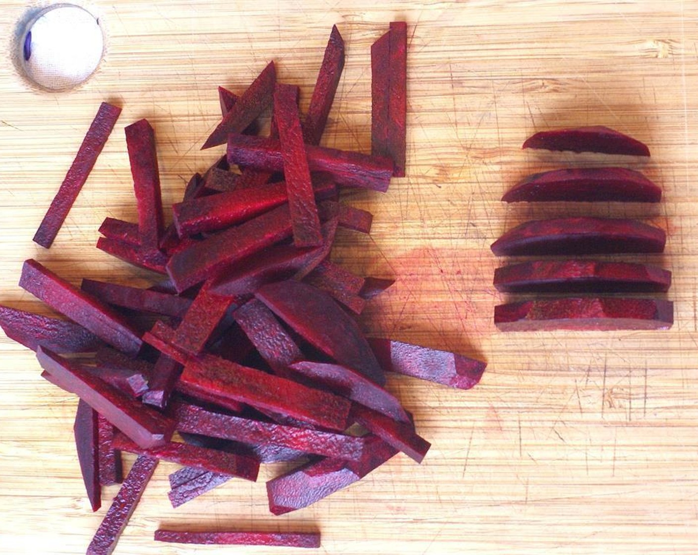 step 6 Peel Beet (1) cut into quarters. Slice each quarter so you are left with thin matchstick sized pieces. Set aside.