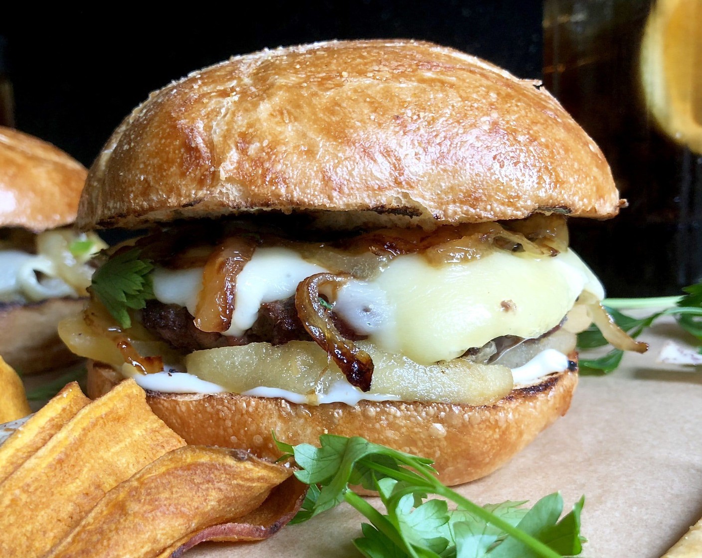 step 13 Assemble burgers: Slather bottom sides of buns with Mayonnaise (to taste) if you like. Divide apples among bottom halves of buns. Top with burgers, cheese side up, then the onions. Sprinkle with Italian Flat-Leaf Parsley (2 Tbsp) if you like, then add bun tops. Enjoy immediately.