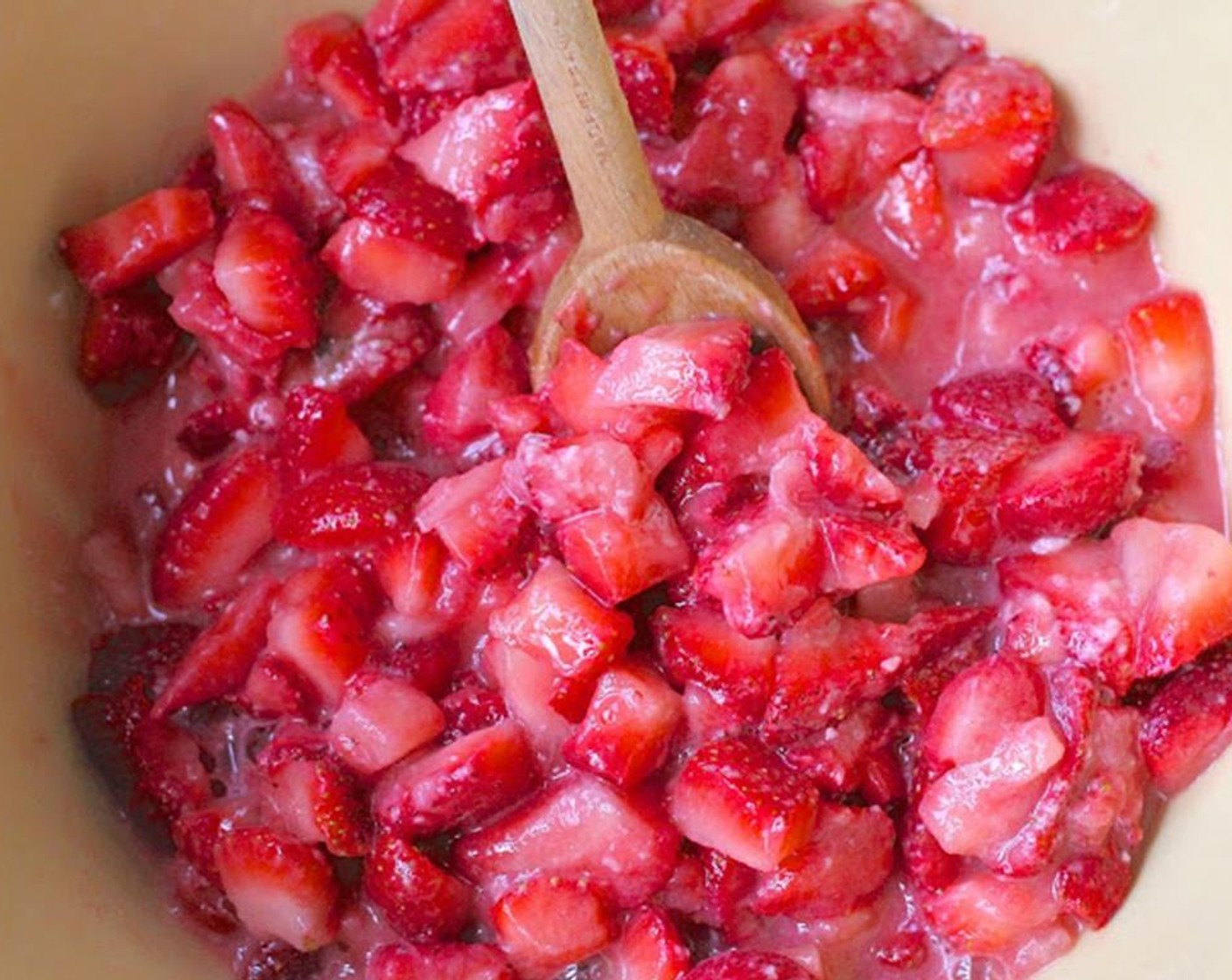 step 9 For the filling, add Granulated Sugar (1/3 cup) and All-Purpose Flour (3 Tbsp) to the sliced strawberries and stir until well mixed.