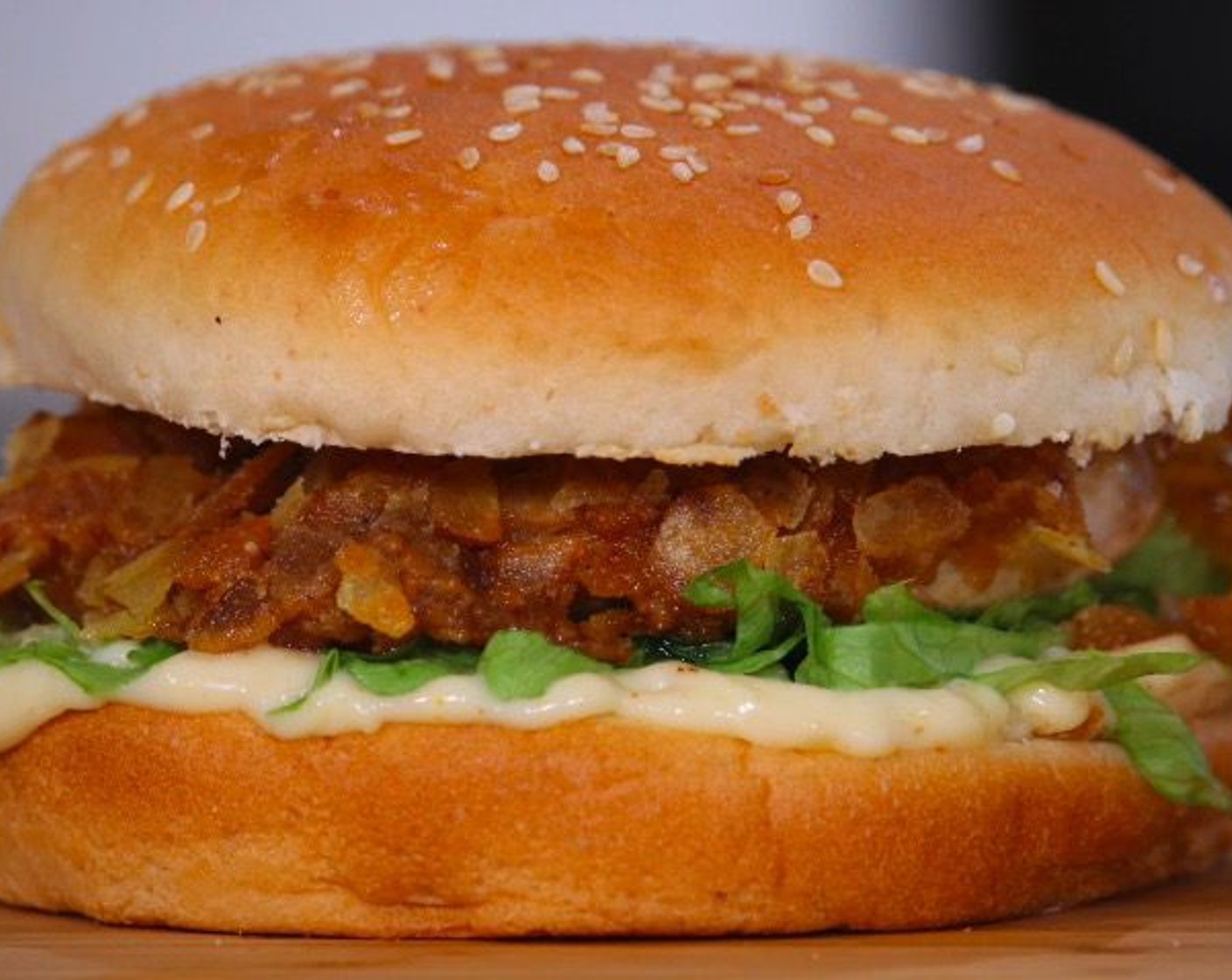 step 7 Place the garlic mayonnaise on the bottom of the Hamburger Bun (1), followed by Shredded Iceberg Lettuce (to taste), the zinger chicken, and the top of the bun. Dig in!