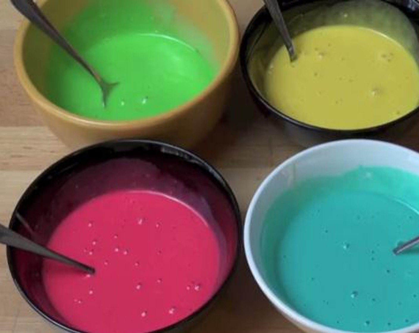 step 4 Divide your dough into four separate bowls. Add different Food Coloring (to taste) of your choice to each bowl.