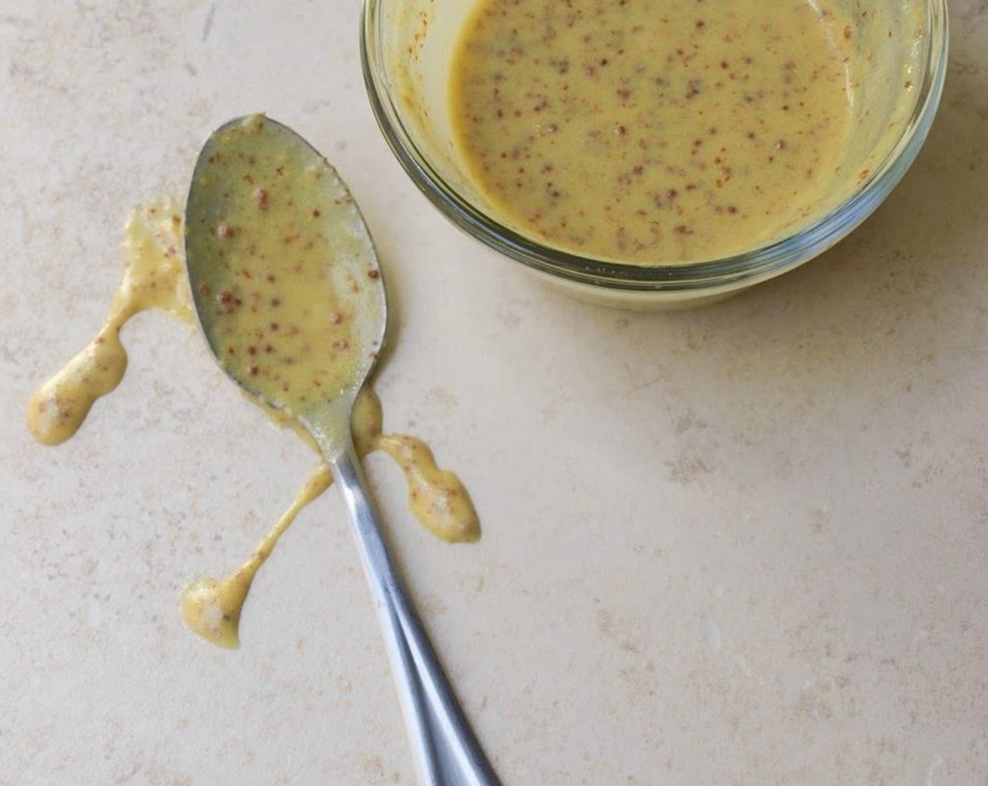 step 5 In a small bowl, combine the Dijon Mustard (1 Tbsp), Whole Grain Mustard (1 Tbsp), juice from Lemon (1), and Olive Oil (1 Tbsp). Set your mustard dressing aside.