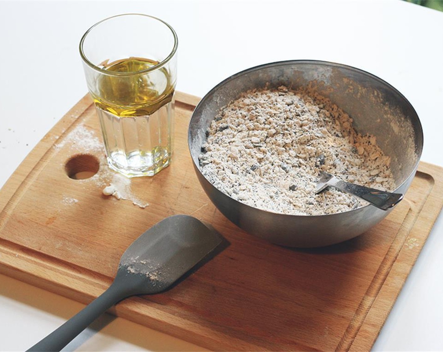 step 1 First mix the Oats (1 cup), Sesame Seeds (2/3 cup), Flaxseeds (2/3 cup), Sunflower Seeds (2/3 cup), Pepitas (2/3 cup), Chia Seeds (2/3 cup), All-Purpose Flour (2 3/4 cups), Baking Powder (1 tsp), Salt (2 tsp), and Unsweetened Cocoa Powder (1 tsp) together in a large bowl.