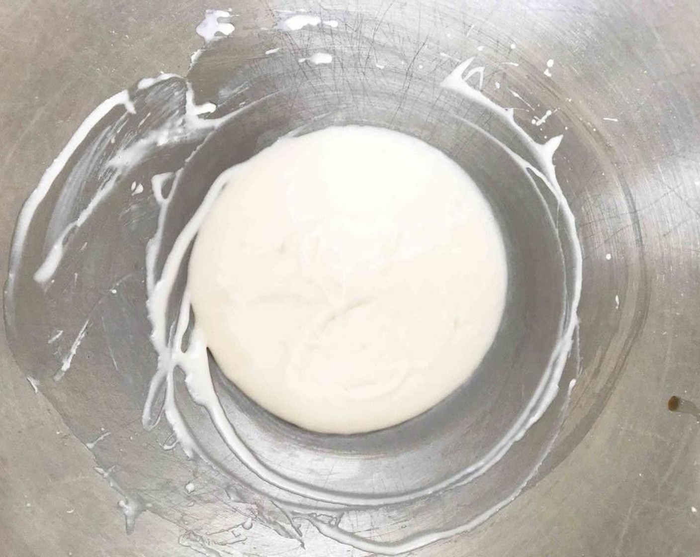 step 2 Add in the Powdered Confectioners Sugar (1 cup), Non-Fat Milk (4 Tbsp), and Vanilla Extract (1/4 tsp) and beat on a low speed until the sweetener is well incorporated, then increase the speed and whip until smooth and creamy. Set aside.