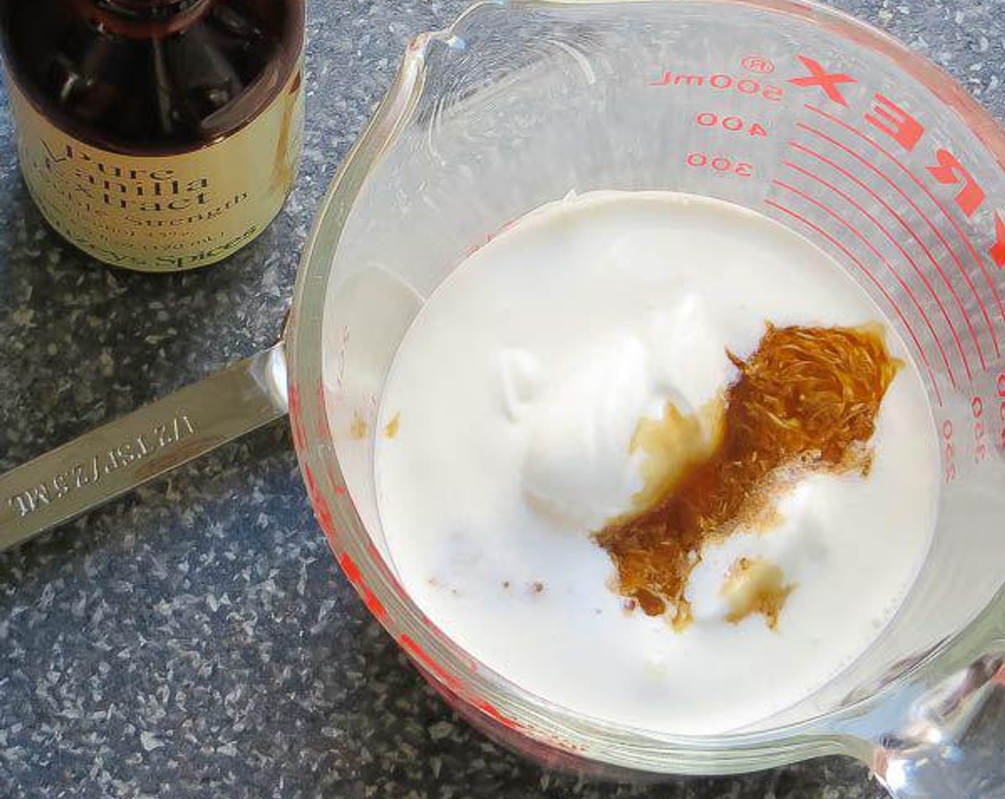 step 5 In a glass measuring cup, add the Whipping Cream (1/2 cup). Drop spoonfuls of the Sour Cream (1/2 cup) into the whipping cream until it measures 1 cup. Add the Vanilla Extract (3/4 tsp) and whisk to combine. Set aside.