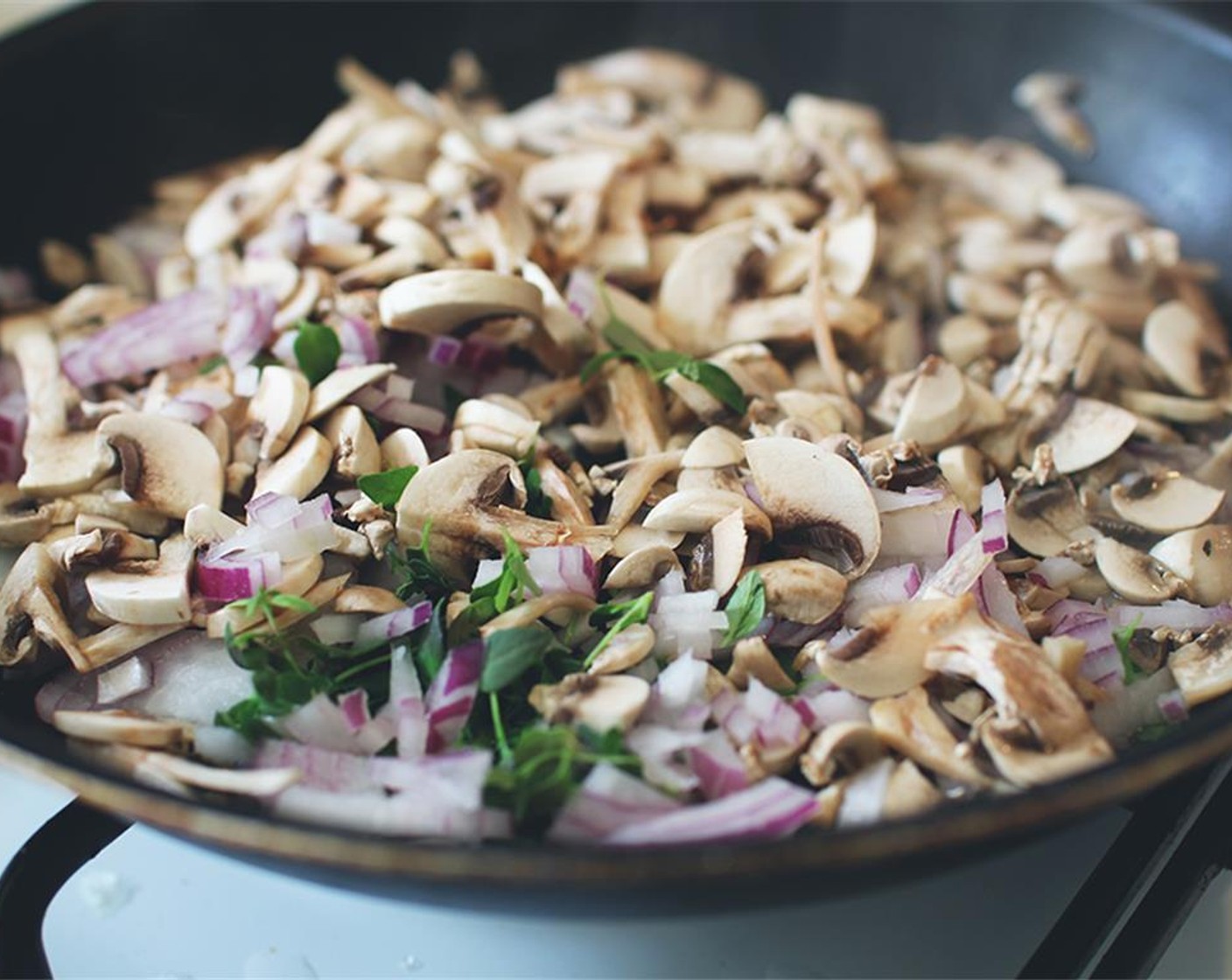step 2 Add Olive Oil (as needed) to pan and fry Red Onion (1) with Mushroom (1 cup) and Fresh Thyme (to taste).