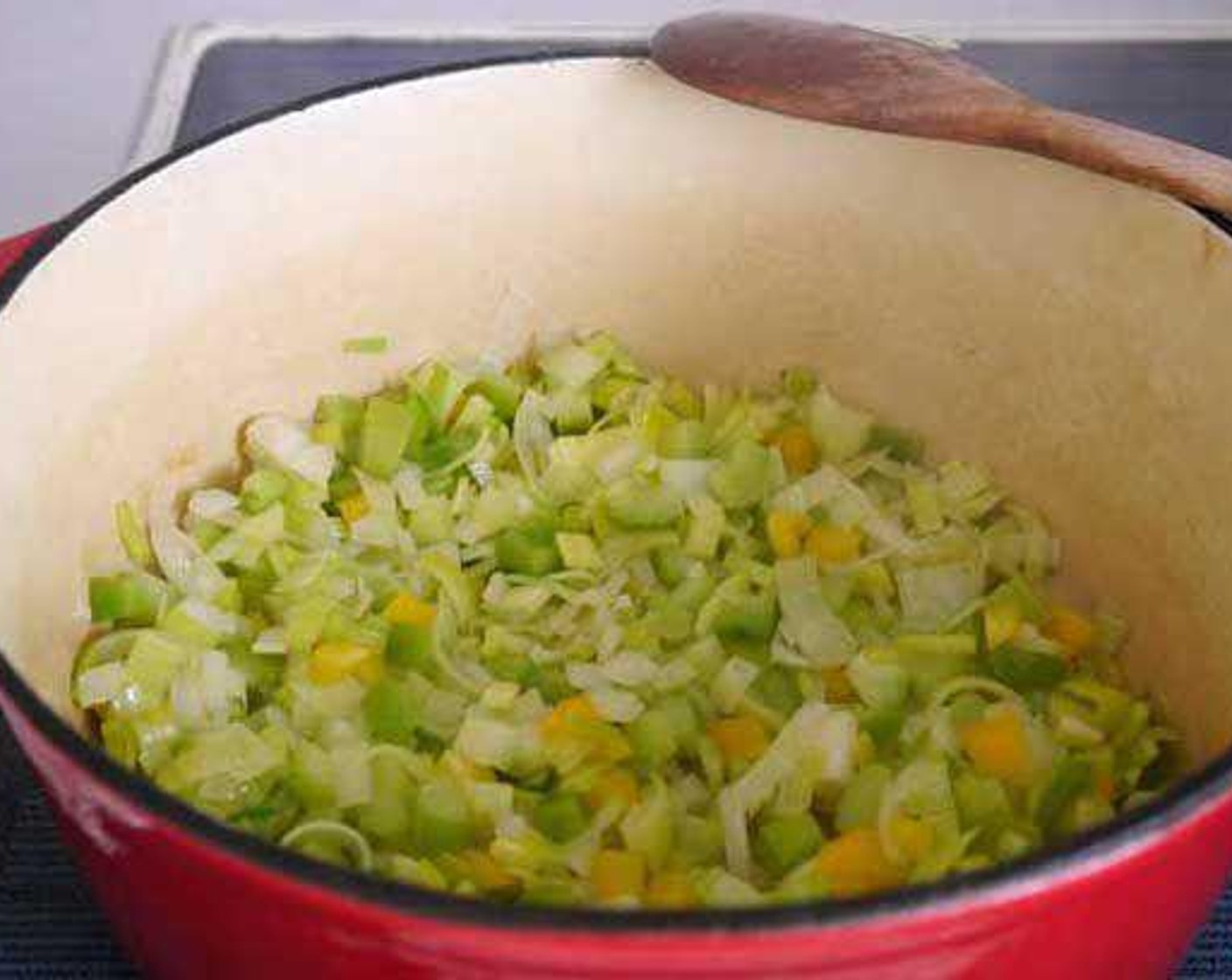 step 1 In a hot pot add the Extra-Virgin Olive Oil (1/4 cup), Onion (1), Garlic (3 cloves), Leek (1/2), Celery (2 stalks), and Yellow Bell Pepper (1/2), stir and leave to cook for 10 min approx at a medium temperature. After 10 minutes add the Carrots (2) and Green Bell Pepper (1/2), stir and leave to cook for 5 minutes.