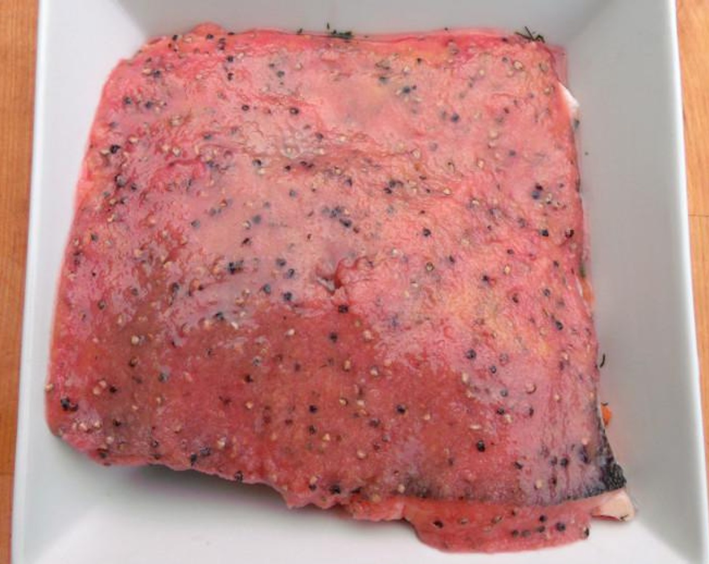 step 5 Cover the salmon with the remaining dry brine, cover airtight, and keep refrigerated for 4 days.