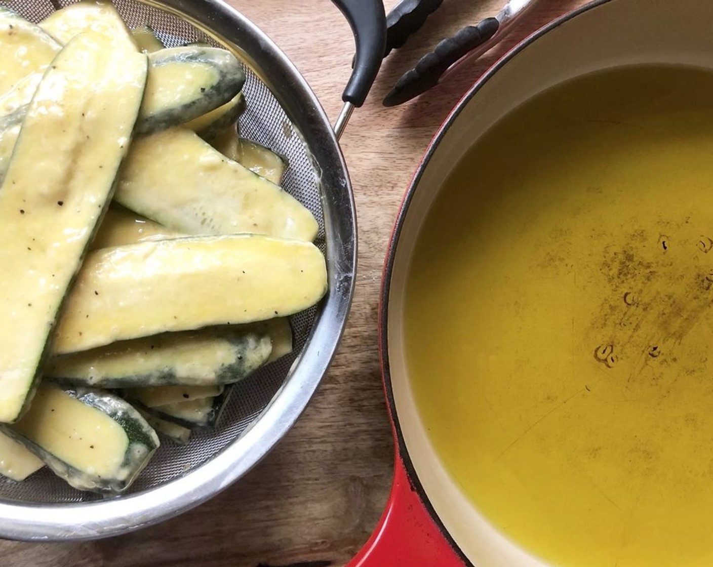 step 4 Pour Canola Oil (as needed) into the skillet to a depth of 1/3-inch and set it over medium-high heat. Cover a baking sheet or large platter with several layers of paper toweling and place it near the stove.