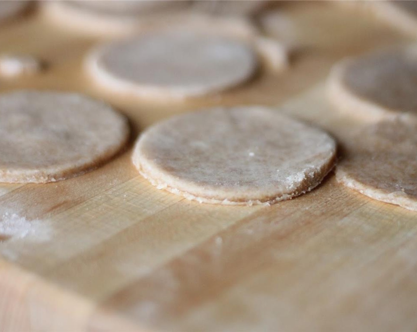 step 8 Place circles onto cookie sheets; fill each cookie sheet, leaving half of the dough for the top pastry.