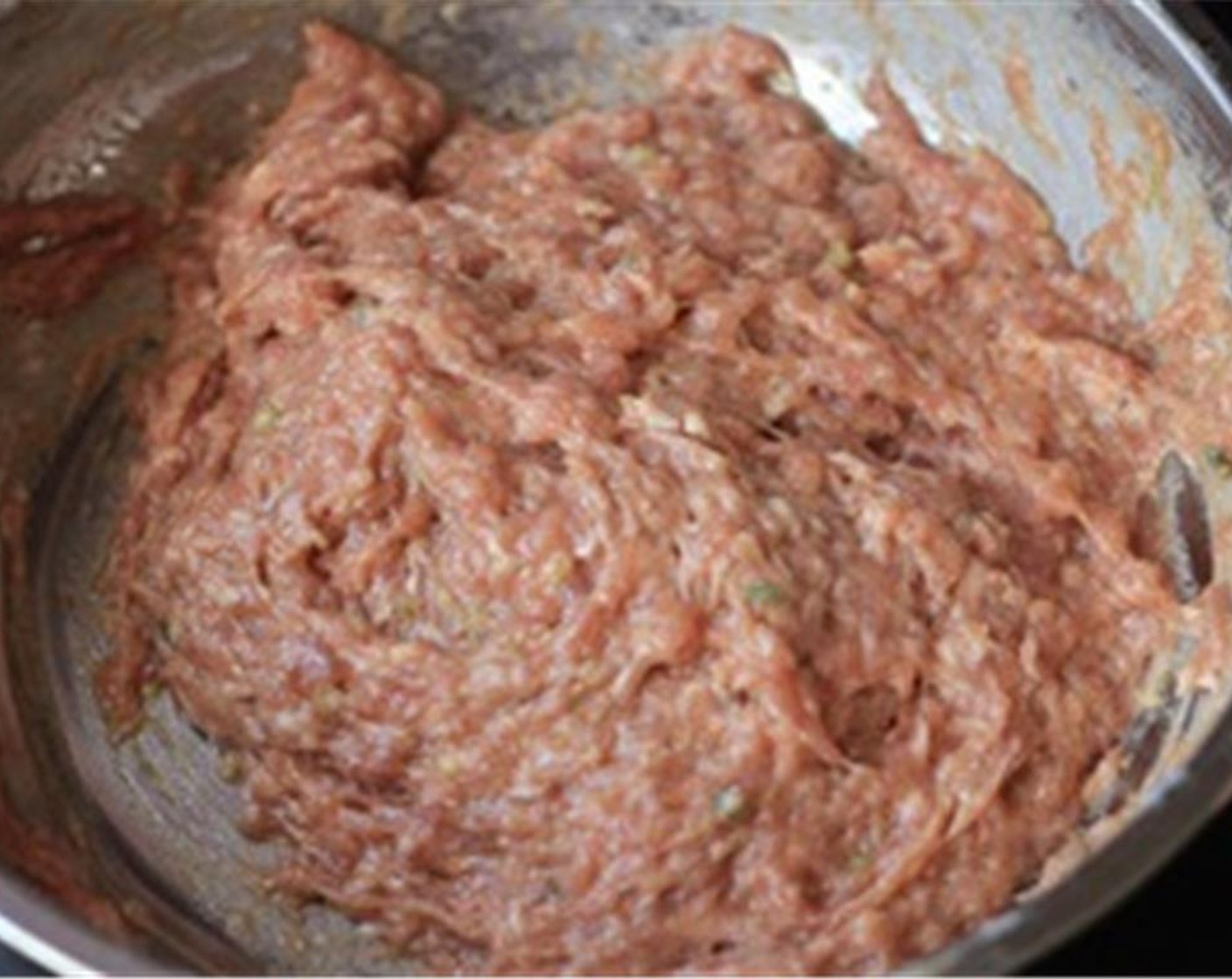 step 6 Then add Oyster Sauce (1 Tbsp), Light Soy Sauce (2 Tbsp), Salt (1/2 Tbsp), Sesame Oil (1 Tbsp), and Granulated Sugar (1 tsp). Mix well and set aside for 10 minutes for better absorption.