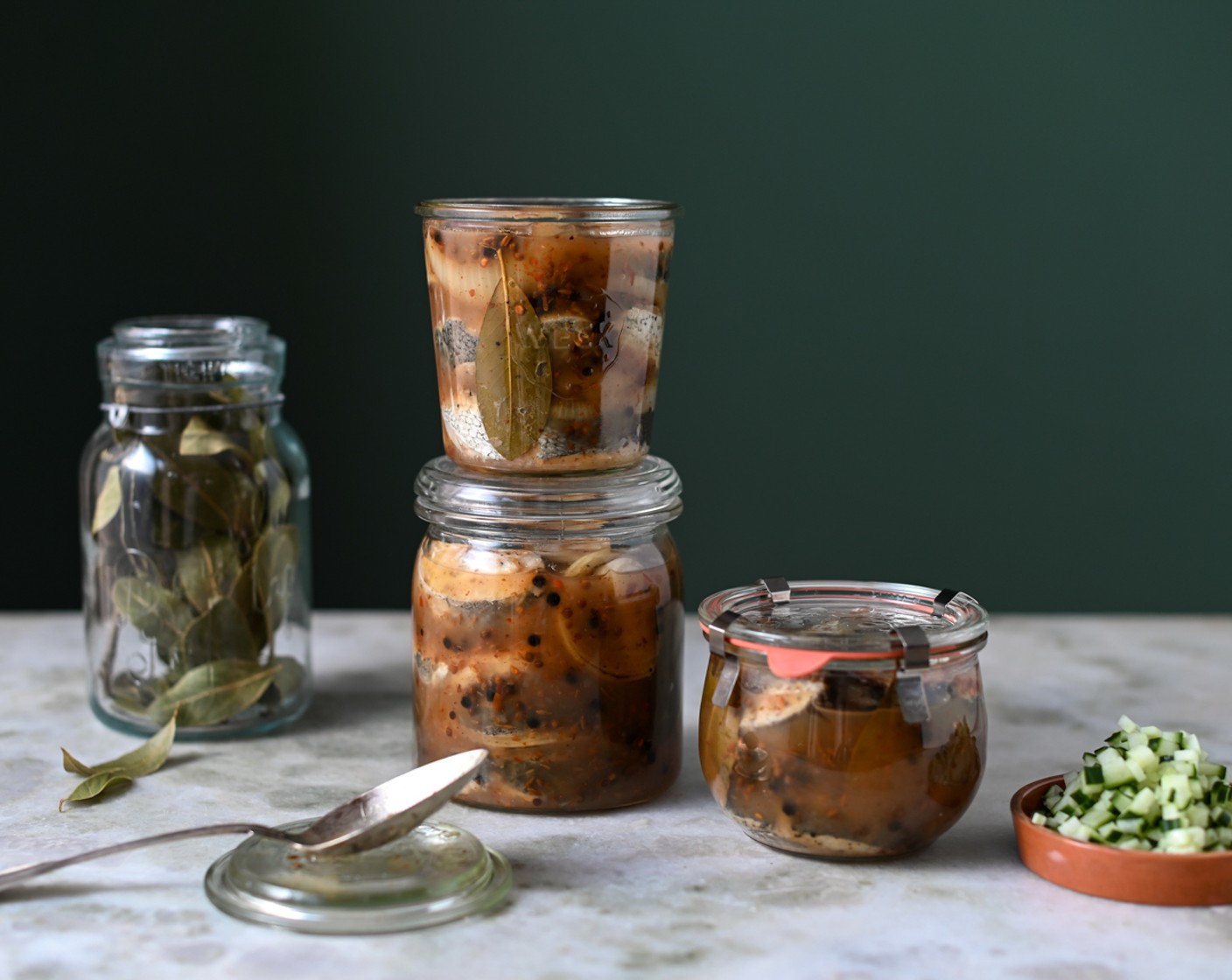 step 6 Place the hake sections into the jars and spoon over the onions and sauce, taking care to entirely cover each piece of fish. Refrigerate the pickled fish and serve after a minimum of three days.