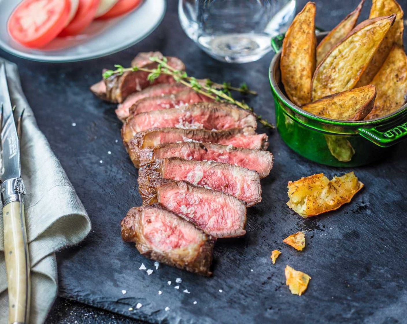 step 13 Once the steak is rested, slice against the grain and serve alongside the yam fries and an optional salad of your choice.