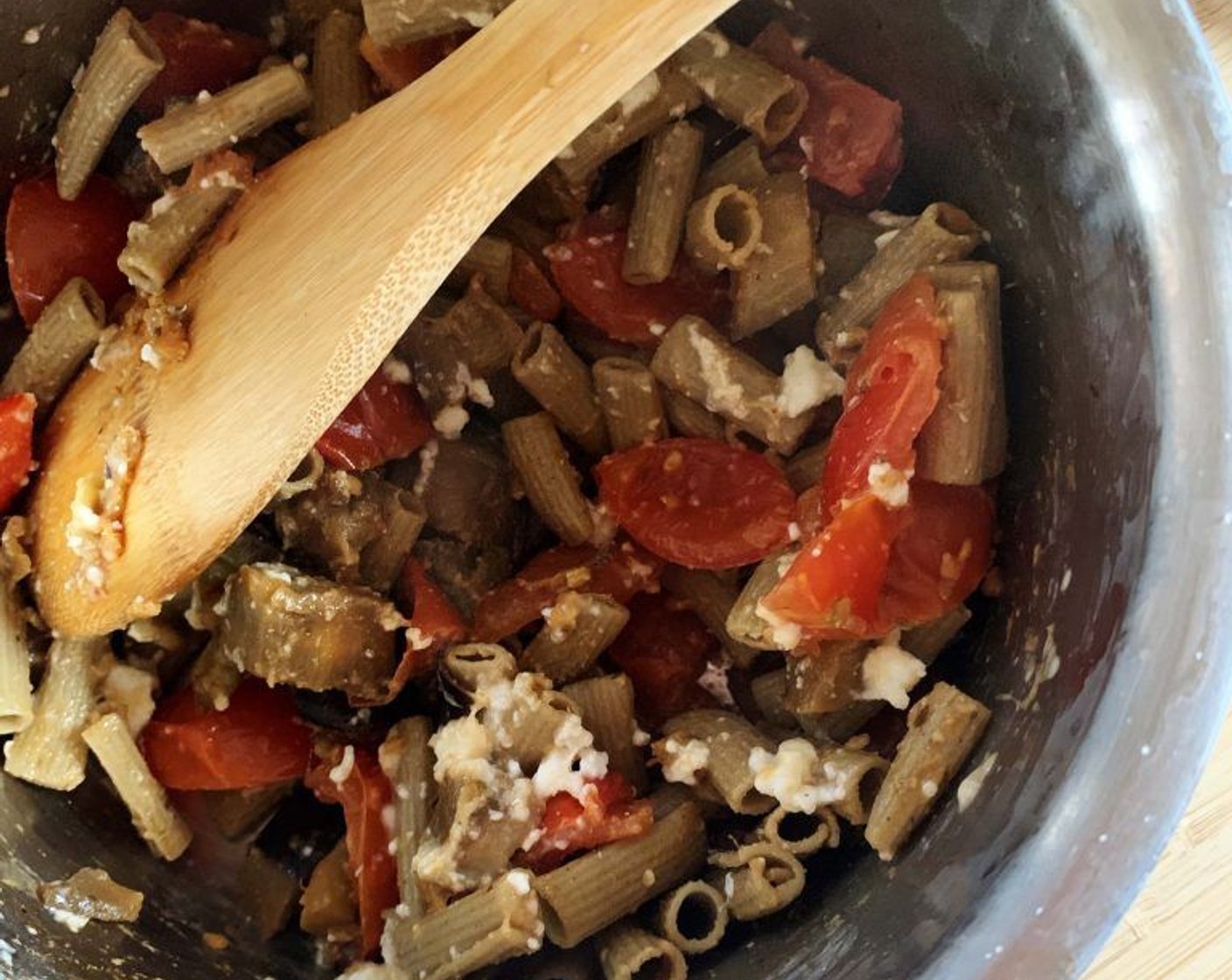 step 8 Add the pasta to the pot and sauté it in the skillet together with 2/3 of the sauce. Mix it with Vegan Cheese (1/3 cup).