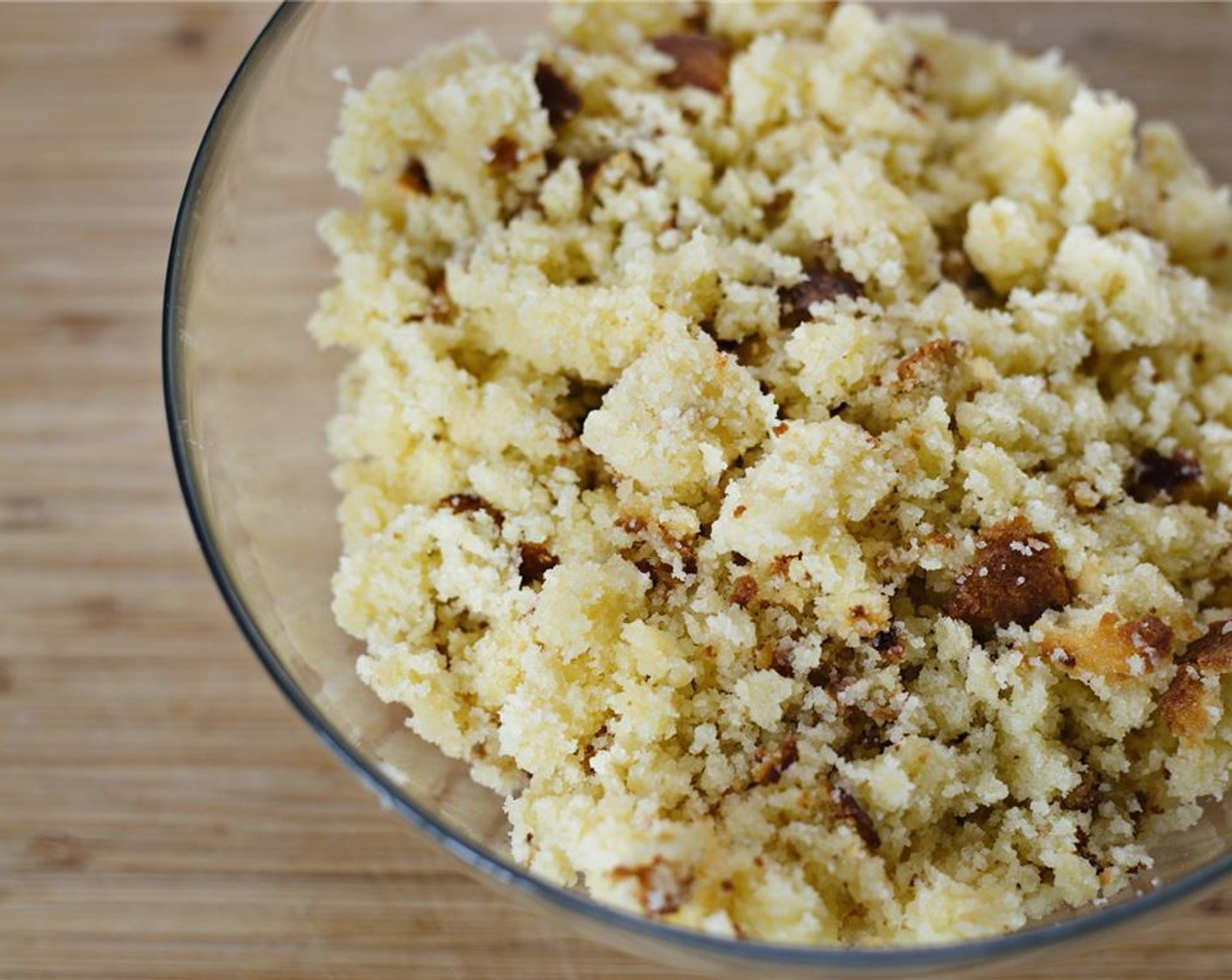 step 3 In a bowl, break up Vanilla Cake (1) into crumbs.