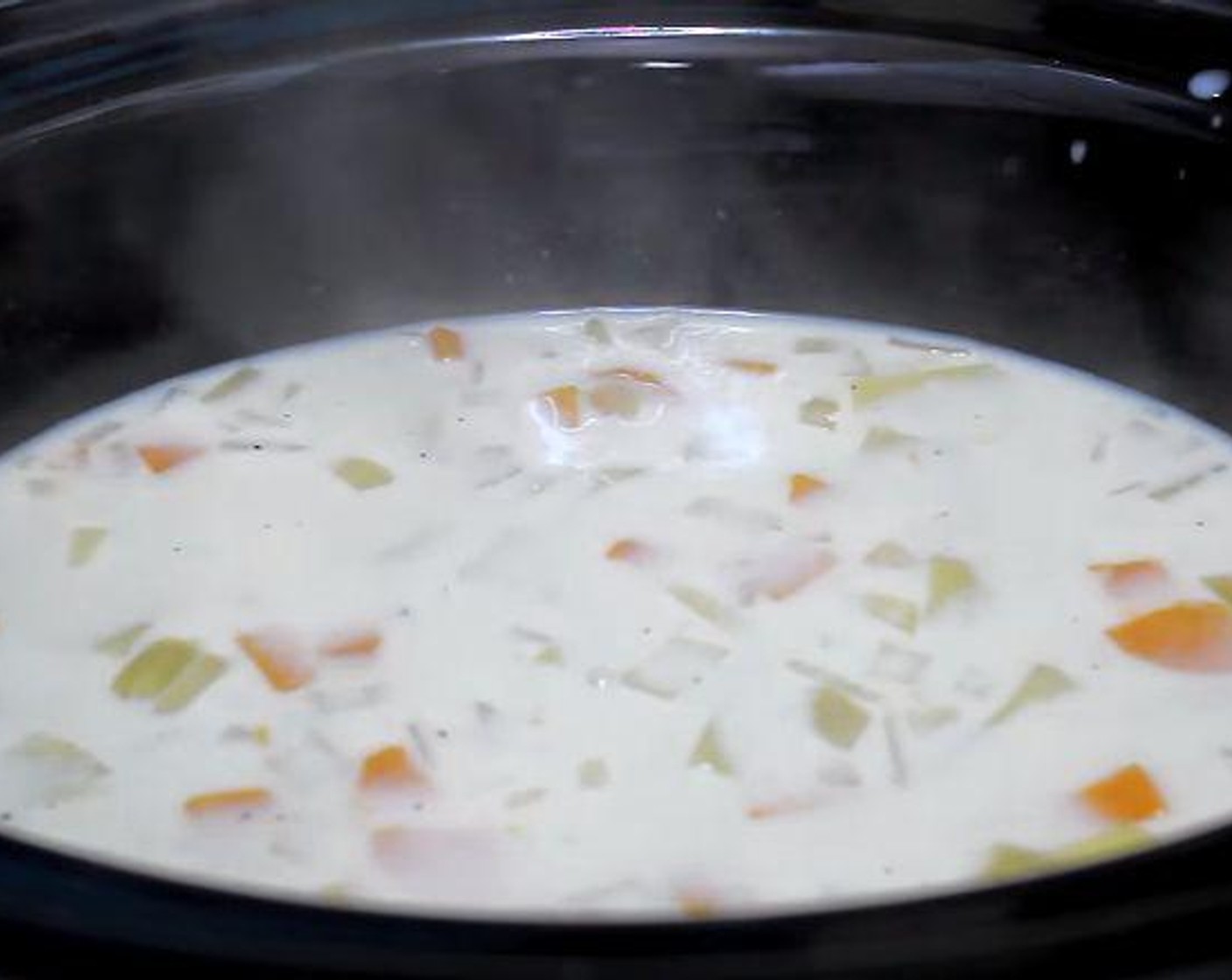 step 2 Stir in Evaporated Milk (1 cup) and Ground Black Pepper (to taste). Cover, cook on HIGH for 15 minutes.