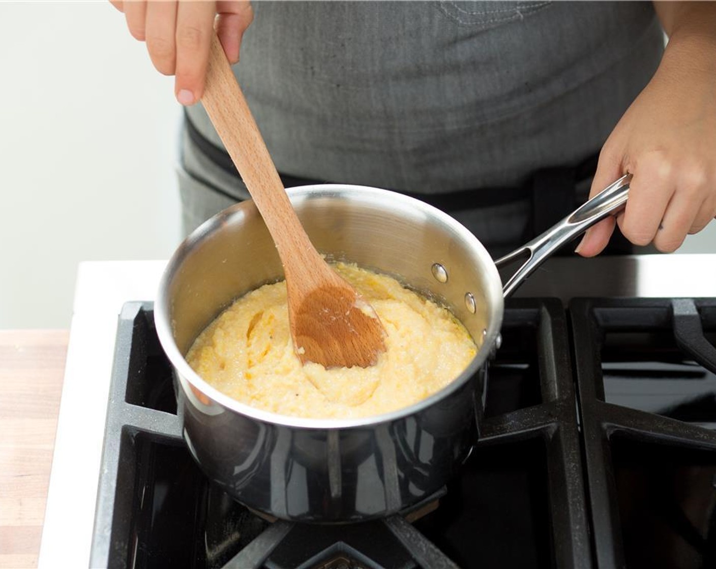 step 10 Add the Polenta Grits (2/3 cup) and reduce the heat to low and cover, stirring occasionally. Cook for 20 minutes, stirring occasionally.