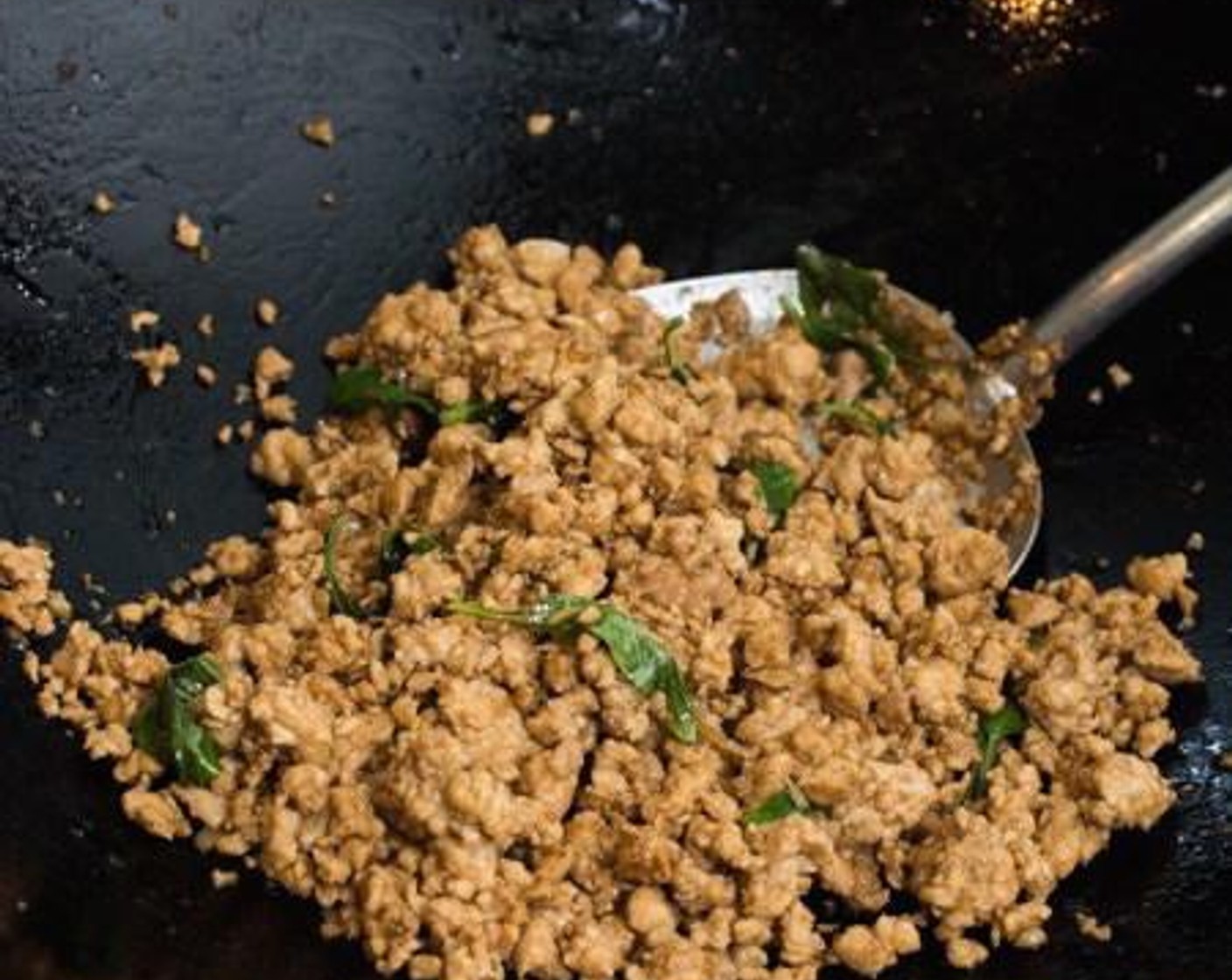 step 5 Add the Fresh Thai Basil (1 cup) and stir-fry until the leaves have wilted.