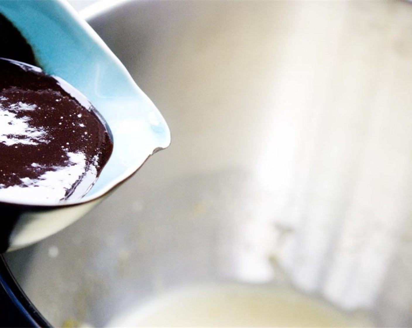 step 3 Using an electric mixer, beat Eggs (4) and Caster Sugar (1/2 cup) for 8 to 10 minutes, or until thick and creamy. Slowly fold in chocolate mixture.