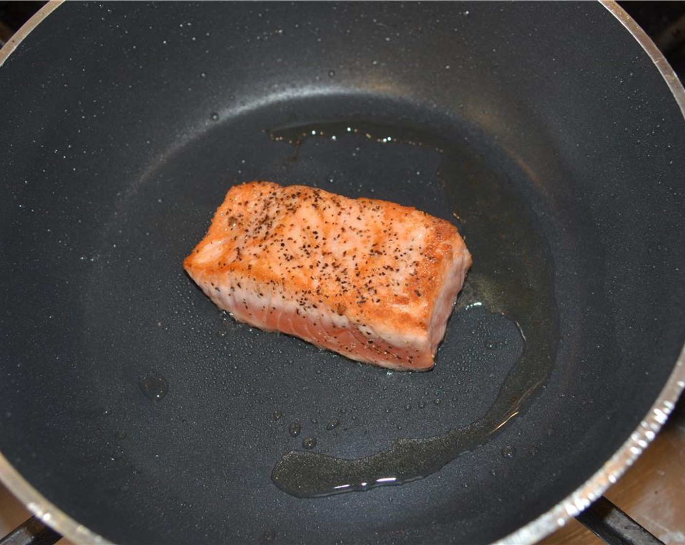 step 16 To finish, place the salmon fillets in the oven to warm. Bake just briefly about 2 minutes for medium rare.